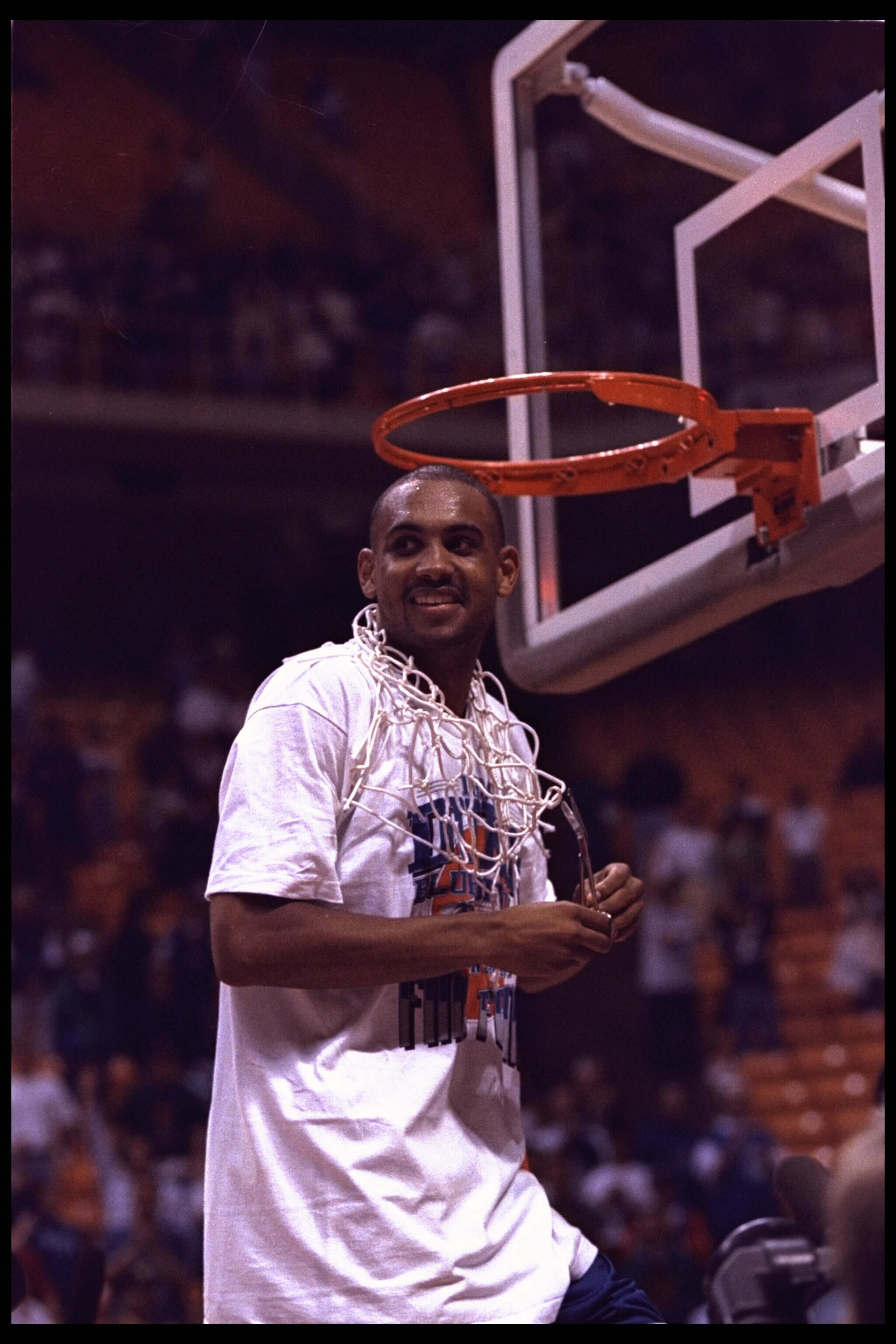 26 Mar 1994: Grant Hill of the Duke Blue Devils cuts the net in celebration of victory over the Purdue Boilermakers in the NCAA Southeast Region final at the Mackey Arena in West Layfayette, Indiana. Duke defeated Purdue 69-60.