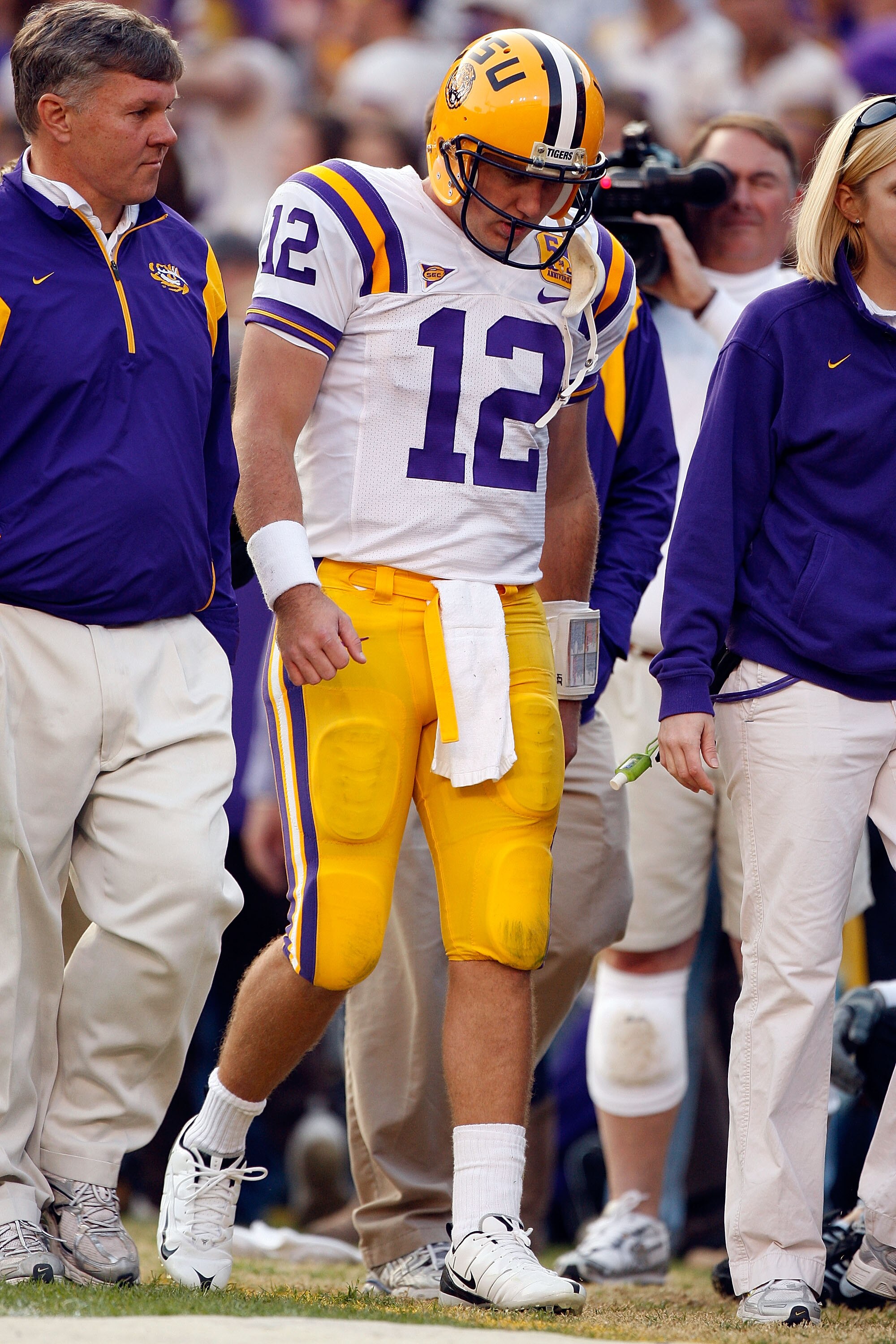 BATON ROUGE, LA - NOVEMBER 22:  Quarterback Jarrett Lee #12 of the Louisiana State University Tigers walks off the field after suffering an injury while playing the Ole Miss Rebels on November 22, 2008 at Tiger Stadium in Baton Rouge, Louisiana. Lee did n
