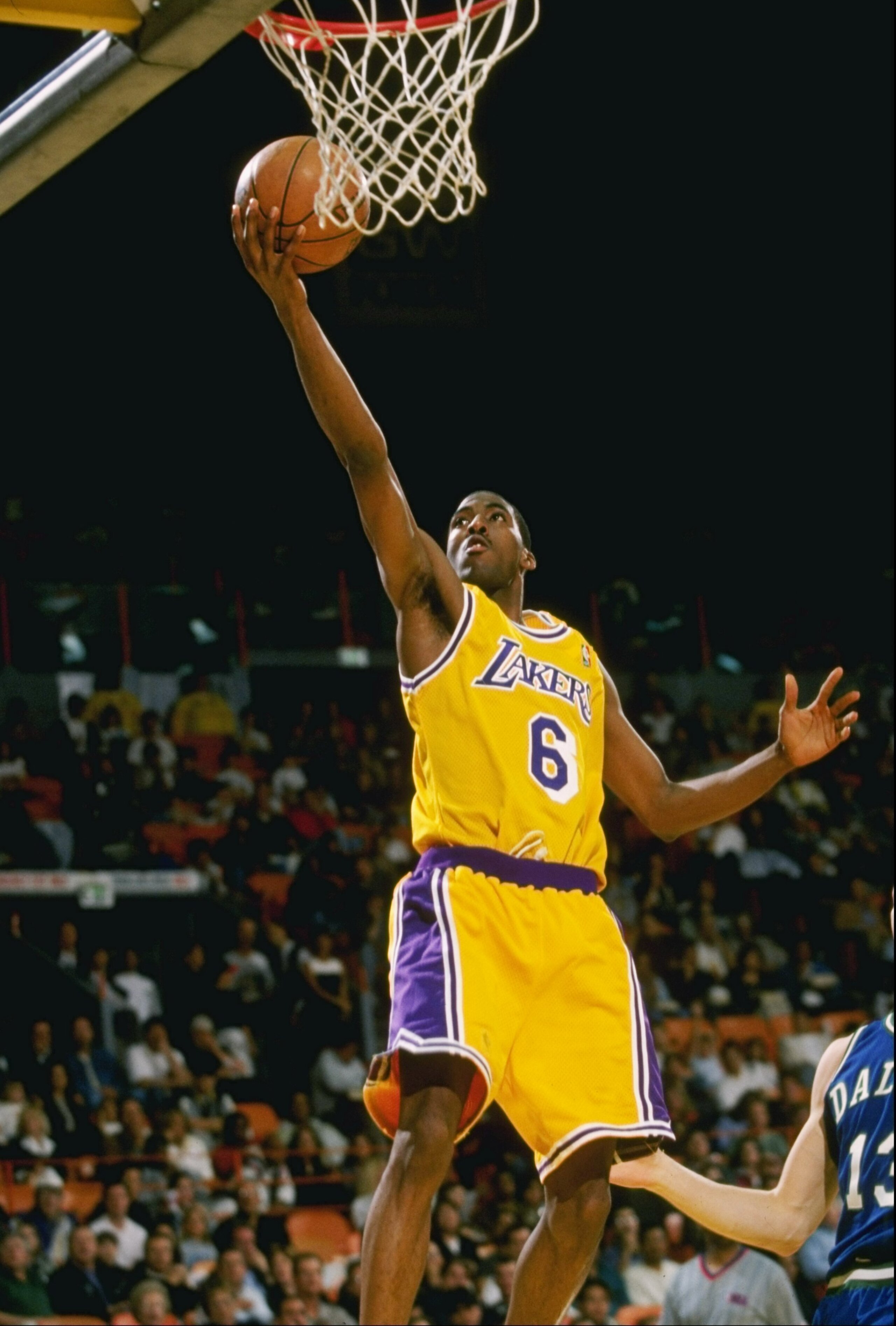 4 Apr 1997:  Guard Eddie Jones of the Los Angeles Lakers lays up the ball during a game against the San Antonio Spurs at the Great Western Forum in Inglewood, California.  The Spurs won the game 94-83.  Mandatory Credit: Jed Jacobsohn  /Allsport
