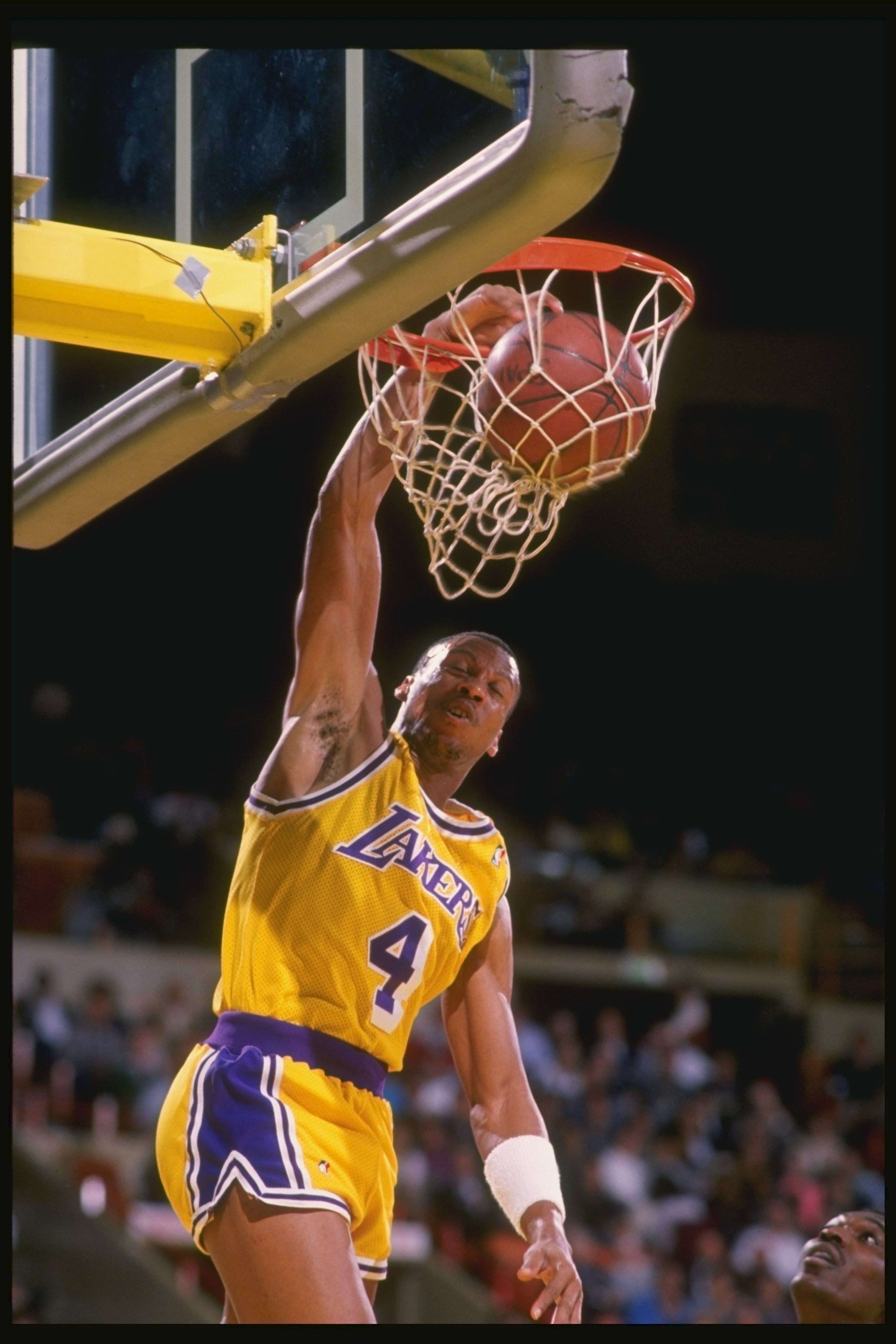 1990:  Guard Byron Scott of the Los Angeles Lakers slam dunks during a game at the Great Western Forum in Inglewood, California.   Mandatory Credit: Mike Powell  /Allsport