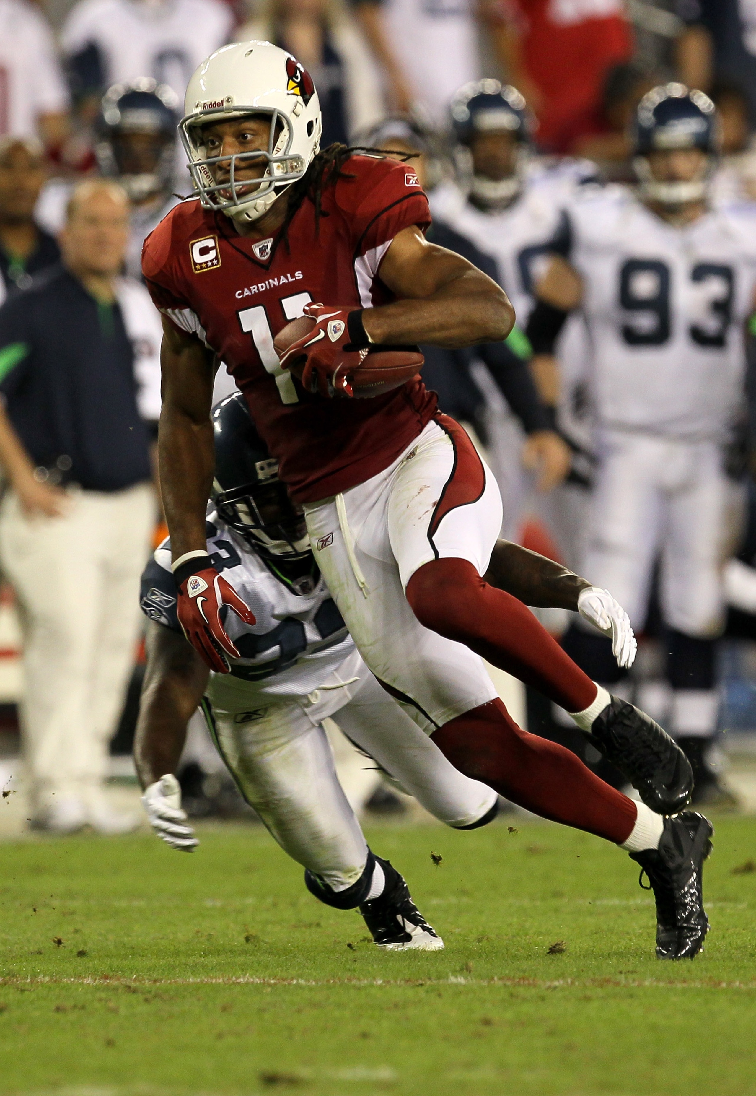 GLENDALE, AZ - NOVEMBER 14: Wide receiver Larry Fitzgerald #11 of the Arizona Cardinals carries the ball against the Seattle Seahawks at University of Phoenix Stadium on November 14, 2010 in Glendale, Arizona. Seattle won 36-18. (Photo by Stephen Dunn/G GLENDALE, AZ - NOVEMBER 14: Wide receiver Larry Fitzgerald #11 of the Arizona Cardinals carries the ball against the Seattle Seahawks at University of Phoenix Stadium on November 14, 2010 in Glendale, Arizona. Seattle won 36-18. (Photo by Stephen Dunn/G
