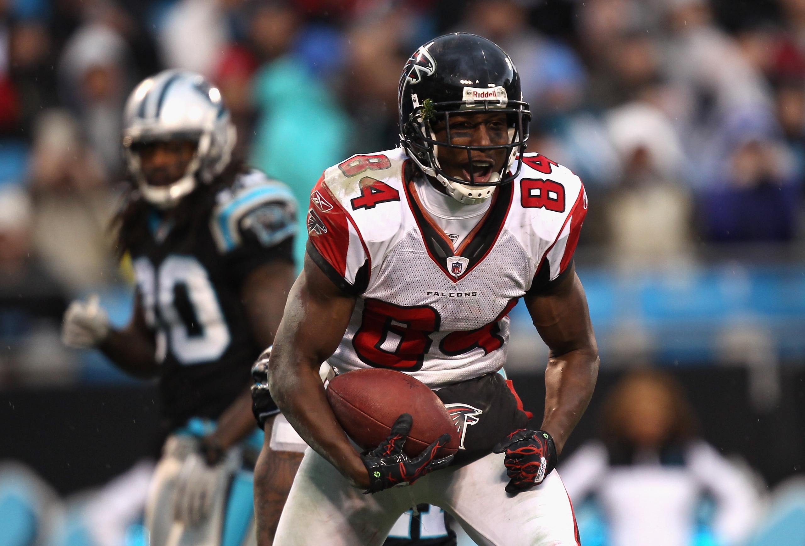 CHARLOTTE, NC - DECEMBER 12:  Roddy White #84 of the Atlanta Falcons reacts after making a catch against the Carolina Panthers during their game at Bank of America Stadium on December 12, 2010 in Charlotte, North Carolina.  (Photo by Streeter Lecka/Getty