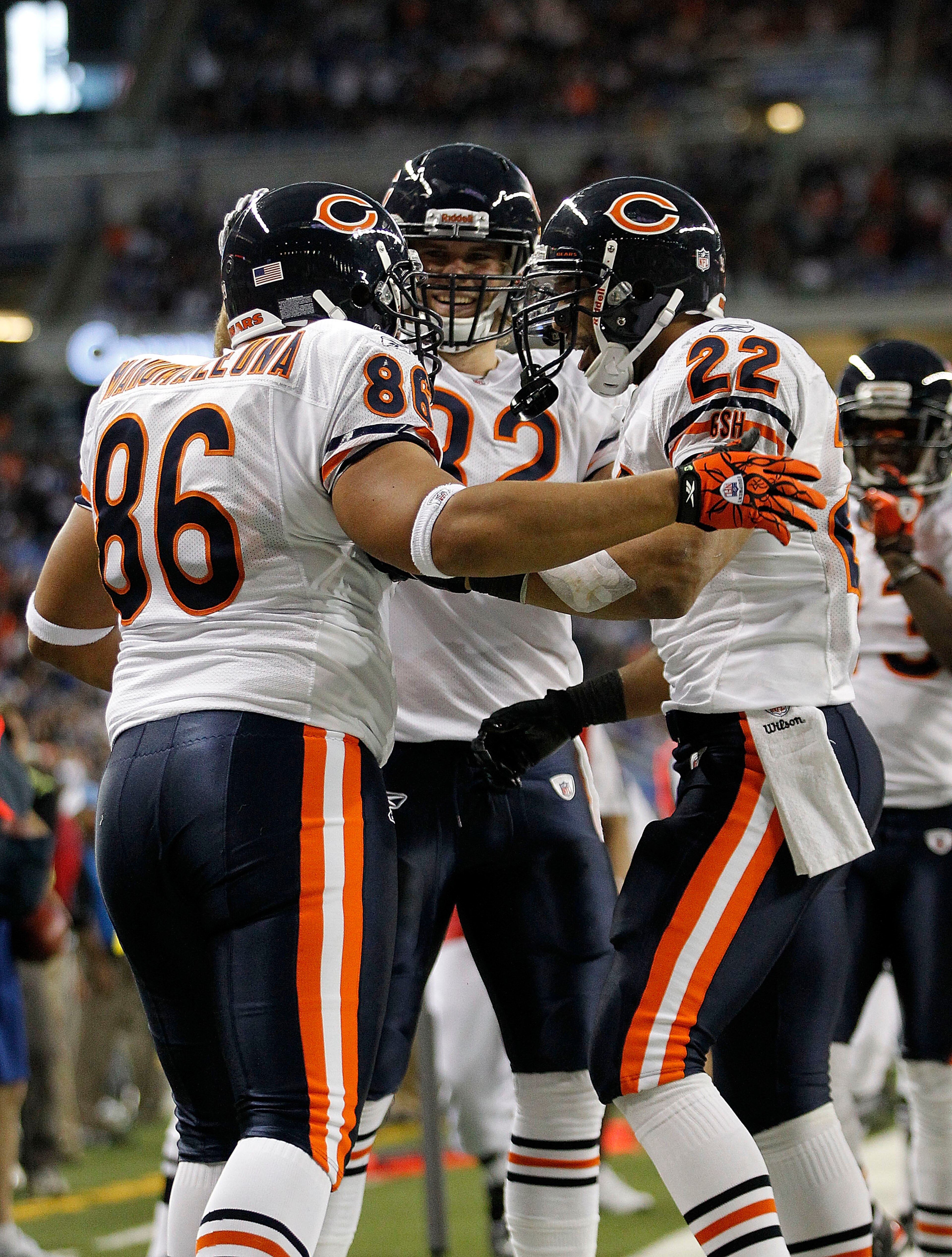 DETROIT - DECEMBER 05: Brandon Manumaleuna #86 of the Chicago Bears celebrates a fourth quarter touchdown with teammates Greg Olsen #82 and Matt Forte #22 during the game against the Detroit Lions at Ford Field on December 5, 2010 in Detroit, Michigan. Th