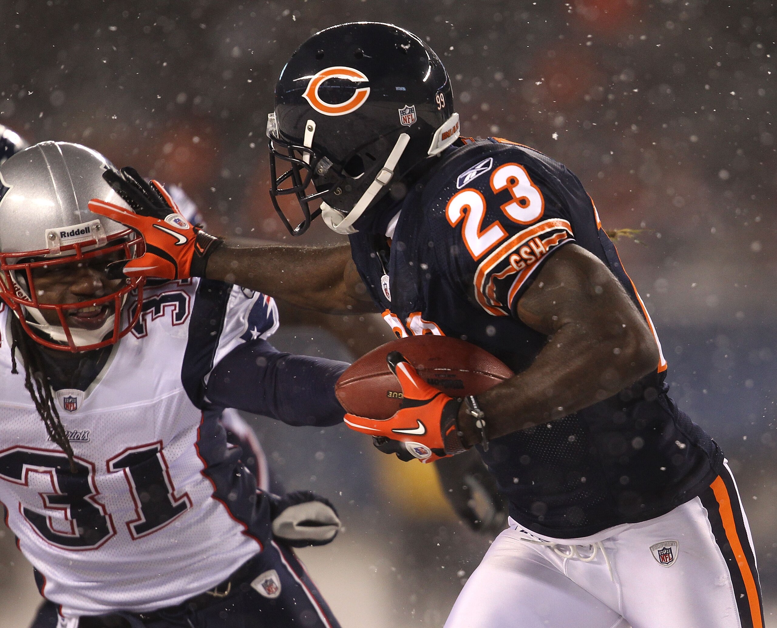 CHICAGO - DECEMBER 12: Devin Hester #23 of the Chicago Bears runs against Brandon Meriweather #31 of the New England Patriots at Soldier Field on December 12, 2010 in Chicago, Illinois. The Patriots defeated the Bears 36-7. (Photo by Jonathan Daniel/Getty CHICAGO - DECEMBER 12: Devin Hester #23 of the Chicago Bears runs against Brandon Meriweather #31 of the New England Patriots at Soldier Field on December 12, 2010 in Chicago, Illinois. The Patriots defeated the Bears 36-7. (Photo by Jonathan Daniel/Getty