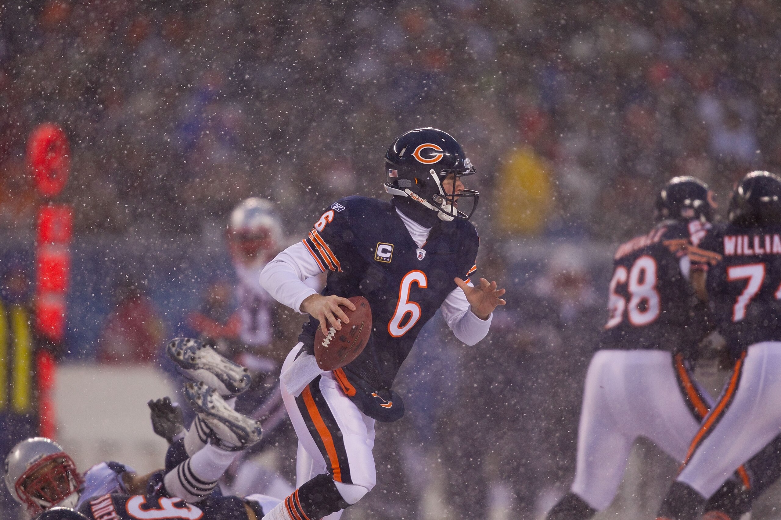 CHICAGO, IL - DECEMBER 12: Jay Cutler #6 of the Chicago Bears looks to pass against the New England Patriots at Soldier Field on December 12, 2010 in Chicago, Illinois.  The Patriots beat the Bears 36-7.  (Photo by Dilip Vishwanat/Getty Images)