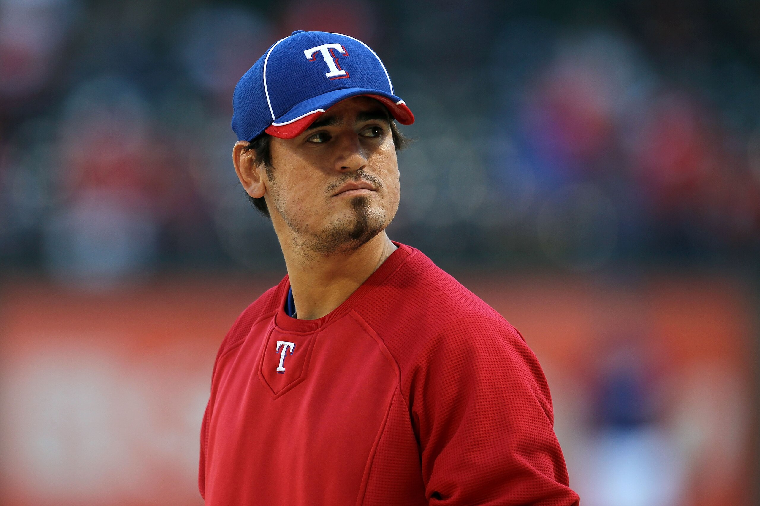 ARLINGTON, TX - OCTOBER 15: Jorge Cantu #8 of the Texas Rangers looks on during batting practice against the New York Yankees in Game One of the ALCS during the 2010 MLB Playoffs at Rangers Ballpark in Arlington on October 15, 2010 in Arlington, Texas. ARLINGTON, TX - OCTOBER 15: Jorge Cantu #8 of the Texas Rangers looks on during batting practice against the New York Yankees in Game One of the ALCS during the 2010 MLB Playoffs at Rangers Ballpark in Arlington on October 15, 2010 in Arlington, Texas.