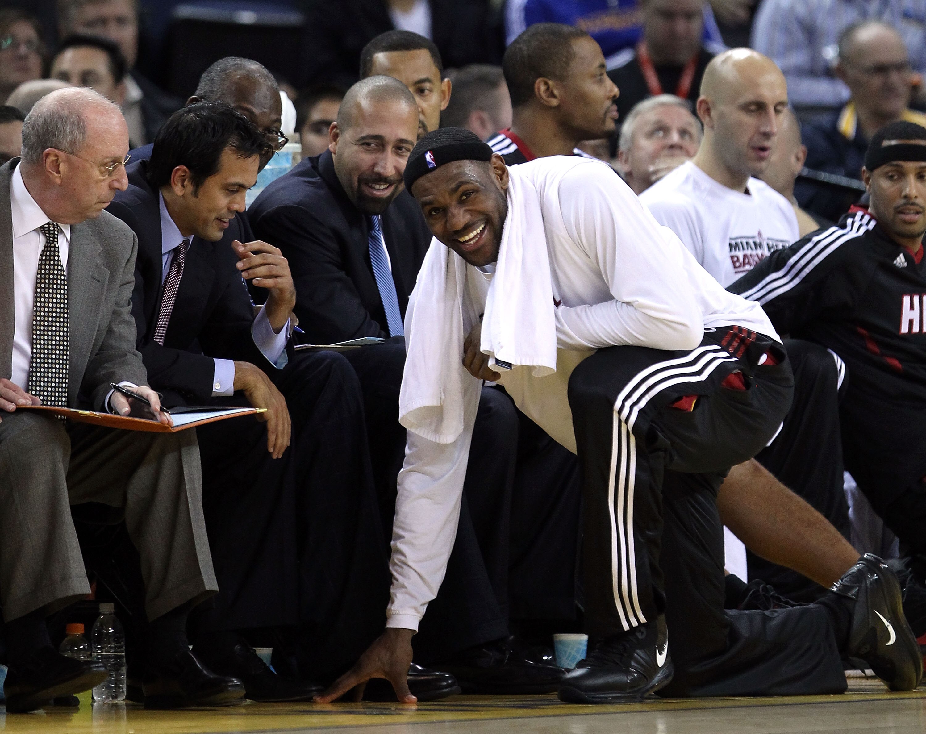 OAKLAND, CA - DECEMBER 10:  Lebron James #6 of the Miami Heat speaks to his coach Erik Spoelstra towards the end of their game against the Golden State Warriors at Oracle Arena on December 10, 2010 in Oakland, California. NOTE TO USER: User expressly ackn