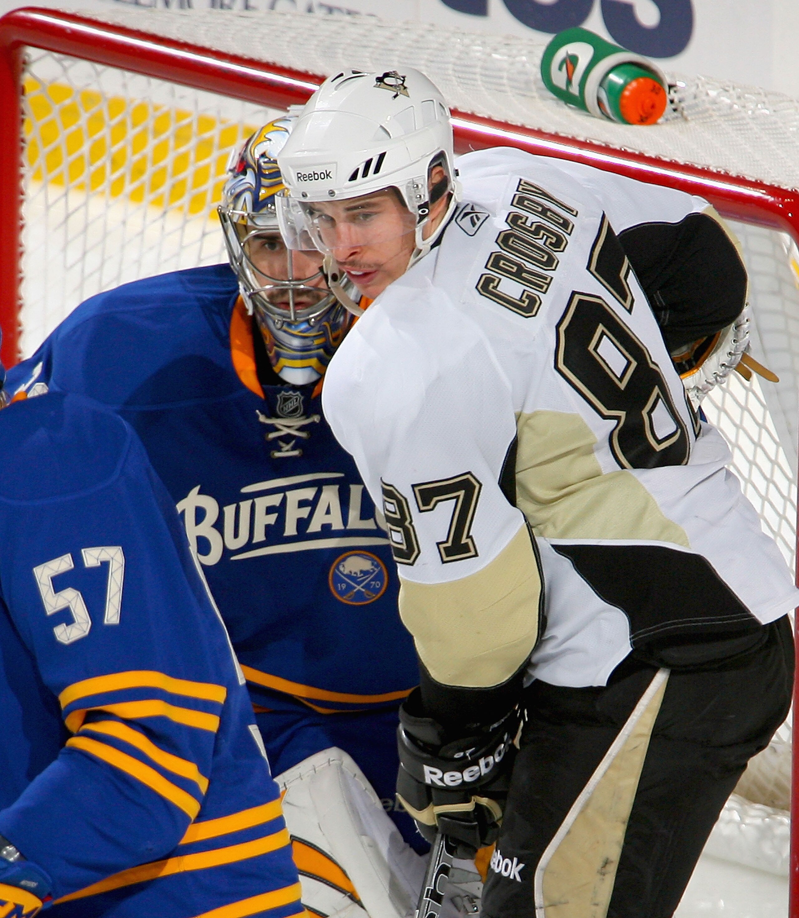 BUFFALO, NY - DECEMBER 11: Sidney Crosby #87  of the Pittsburgh Penguins pinches in on Ryan Miller #30 of the Buffalo Sabres  at HSBC Arena on December 11, 2010 in Buffalo, New York.  (Photo by Rick Stewart/Getty Images)