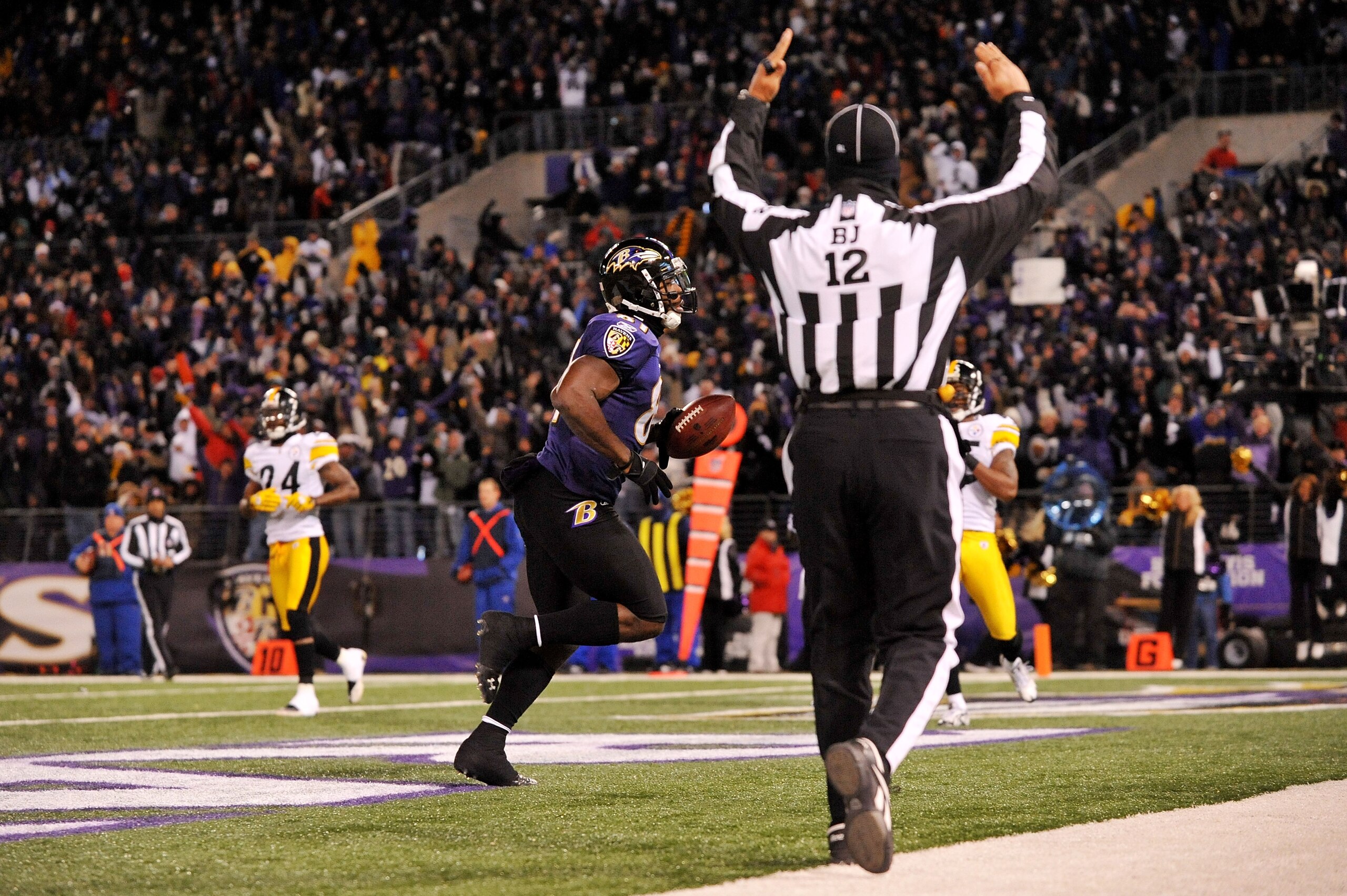 BALTIMORE, MD - DECEMBER 05: Wide receiver Anquan Boldin #81 of the Baltimore Ravens scores a touchdown against the Pittsburgh Steelers during the first quarter of the game at M&T Bank Stadium on December 5, 2010 in Baltimore, Maryland. (Photo by Larry BALTIMORE, MD - DECEMBER 05: Wide receiver Anquan Boldin #81 of the Baltimore Ravens scores a touchdown against the Pittsburgh Steelers during the first quarter of the game at M&T Bank Stadium on December 5, 2010 in Baltimore, Maryland. (Photo by Larry
