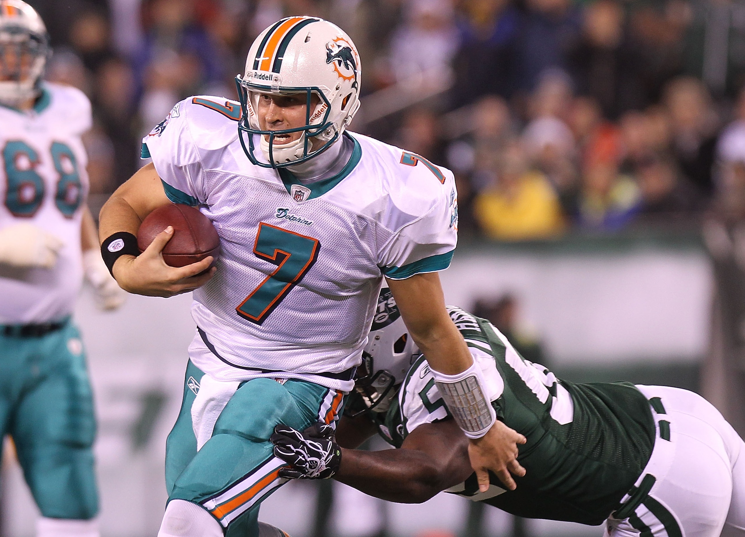 EAST RUTHERFORD, NJ - DECEMBER 12:  Chad Henne #7 of the Miami Dolphins rushes against the New York Jets at New Meadowlands Stadium on December 12, 2010 in East Rutherford, New Jersey.  (Photo by Nick Laham/Getty Images)