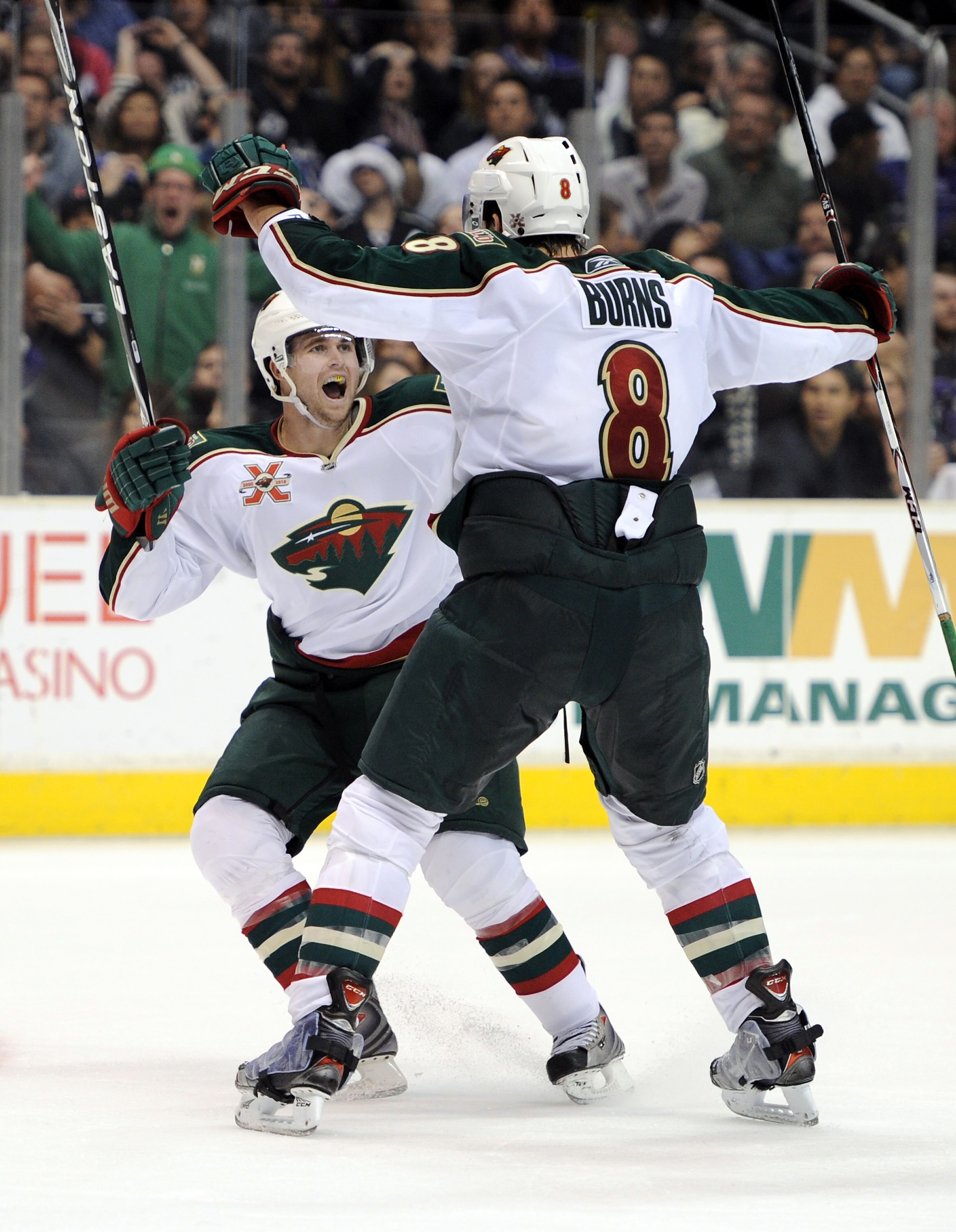 LOS ANGELES, CA - DECEMBER 11:   Pierre-Marc Bouchard #96 of the Minnesota Wild reacts to the overtime goal of Brent Burns #8 for a 3-2 win over the Los Angeles Kings at the Staples Center on December 11, 2010 in Los Angeles, California.  (Photo by Harry