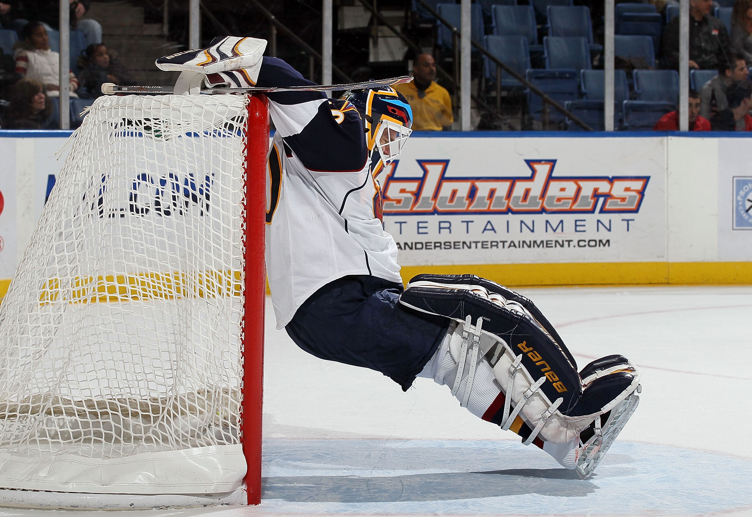 UNIONDALE, NY - DECEMBER 11:  Chris Mason #50 of the Atlanta Thrashers stretches during a time out agianst the New York Islanders looks on on December 11, 2010 at Nassau Coliseum in Uniondale, New York.  (Photo by Jim McIsaac/Getty Images)