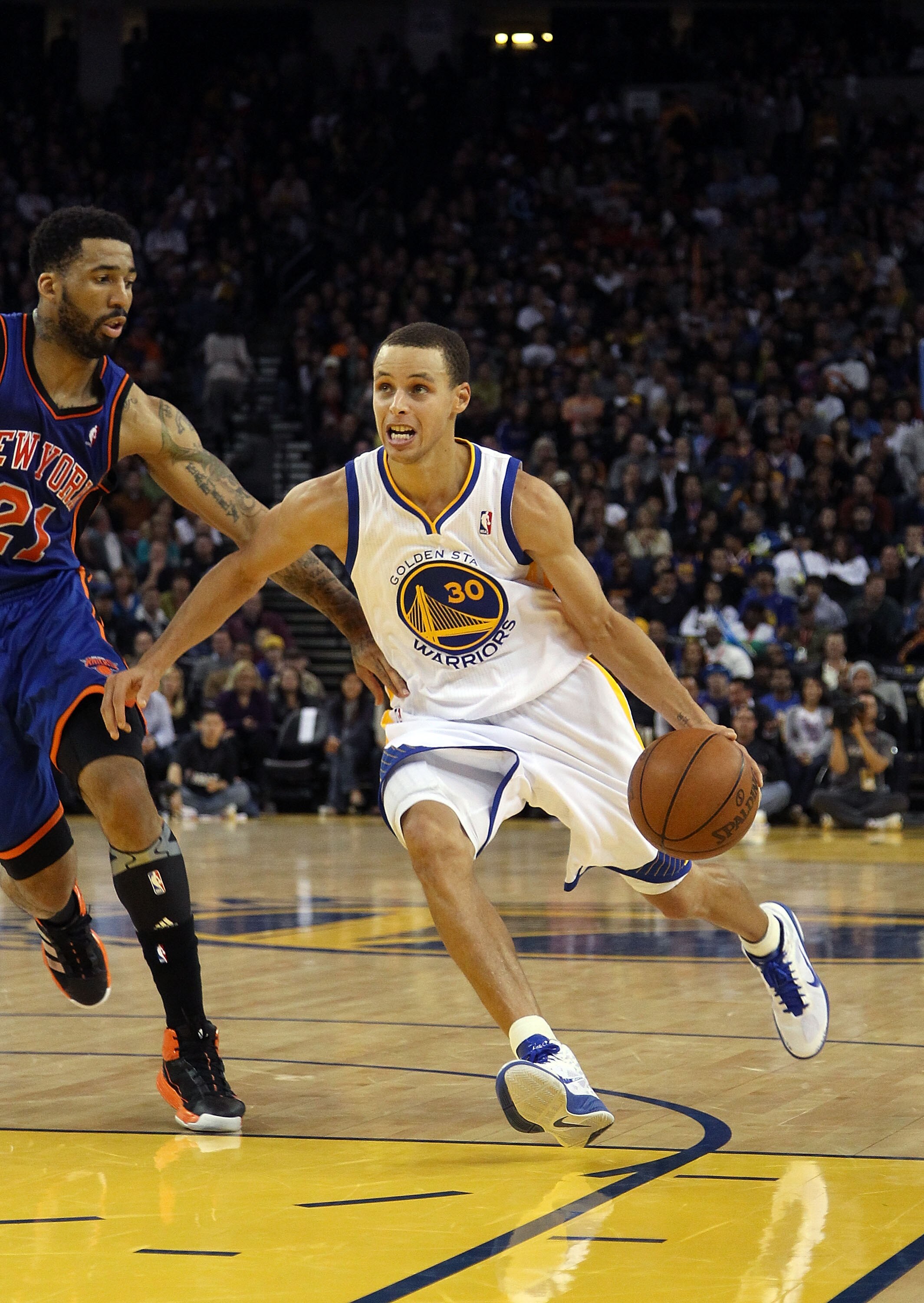 OAKLAND, CA - NOVEMBER 19:  Stephen Curry #30 of the Golden State Warriors in action against the New York Knicks at Oracle Arena on November 19, 2010 in Oakland, California. NOTE TO USER: User expressly acknowledges and agrees that, by downloading and or