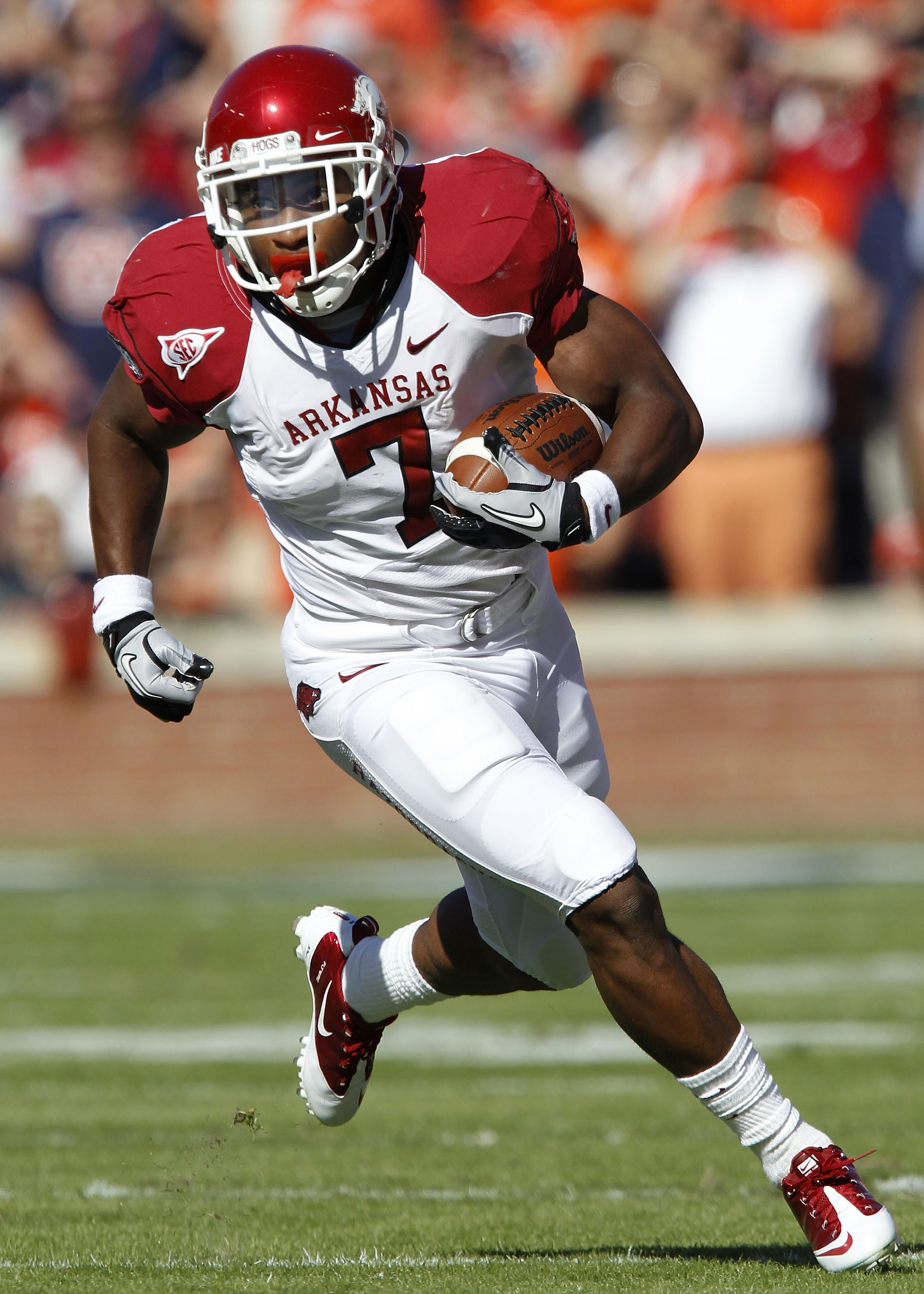 AUBURN, AL - OCTOBER 16:  Running back Knile Davis #7 of the Arkansas Razorbacks runs with the ball during the game against the Auburn Tigers at Jordan-Hare Stadium on October 16, 2010 in Auburn, Alabama.  The Tigers beat the Razorbacks 65-43.  (Photo by 
