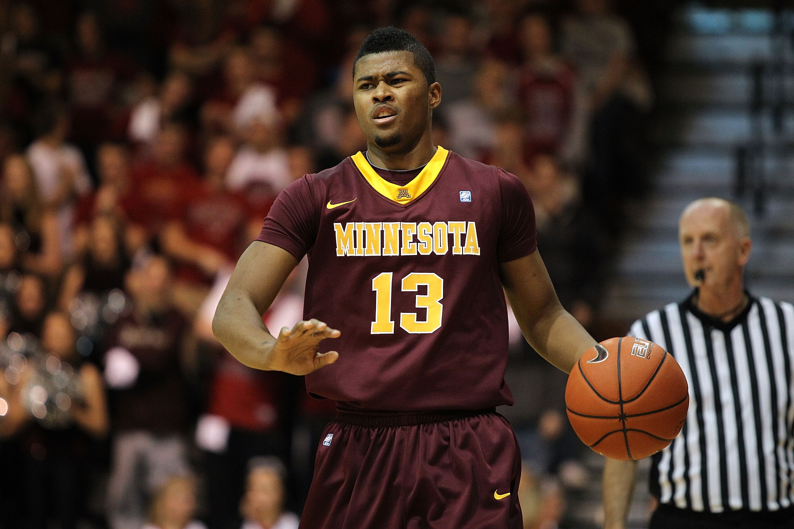 PHILADELPHIA, PA - DECEMBER 08:  Maverick Ahanmisi #13 of the Minnesota Golden Gophers brings the ball up court agianst the St. Joseph's Hawks at Michael J. Hagan Arena on December 8, 2010 in Philadelphia, Pennsylvania.  (Photo by Chris Chambers/Getty Ima