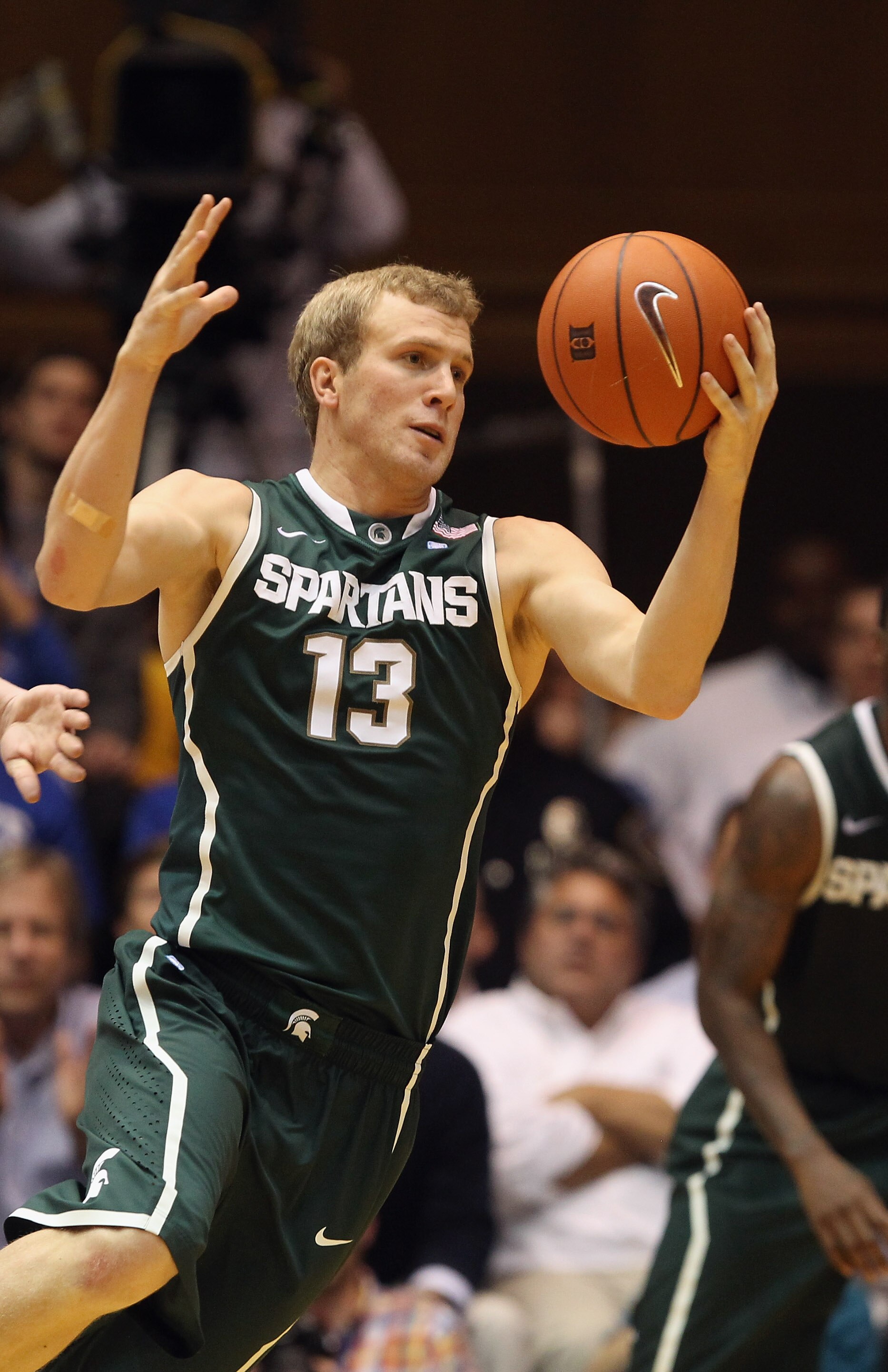 DURHAM, NC - DECEMBER 01:  Austin Thornton #13 of the Michigan State Spartans against the Duke Blue Devils during their game at Cameron Indoor Stadium on December 1, 2010 in Durham, North Carolina.  (Photo by Streeter Lecka/Getty Images)