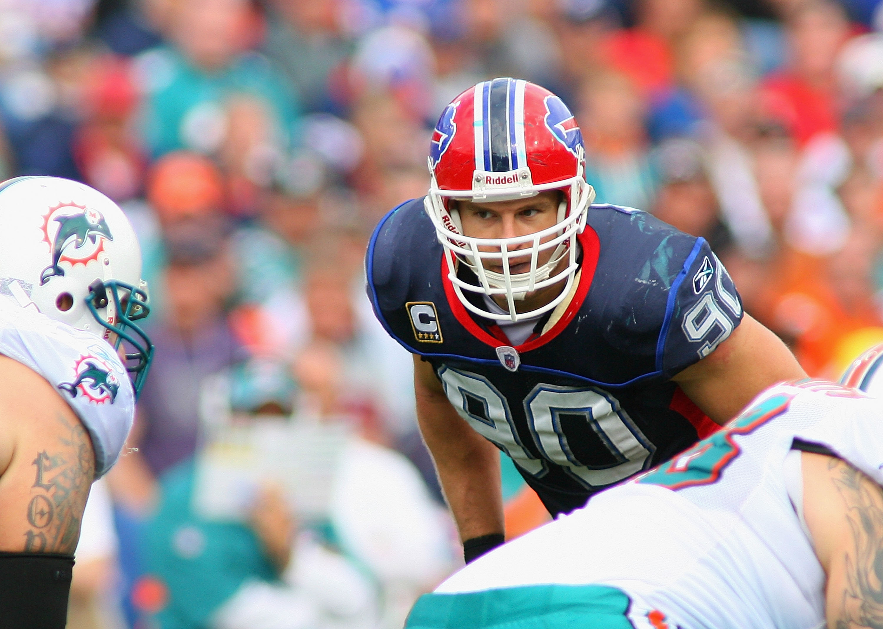 ORCHARD PARK, NY - SEPTEMBER 12: Chris Kelsay #90 of  the Buffalo Bills readies for a play against the Miami Dolphins during the NFL season opener at Ralph Wilson Stadium on September 12, 2010 in Orchard Park, New York.  (Photo by Rick Stewart/Getty Image