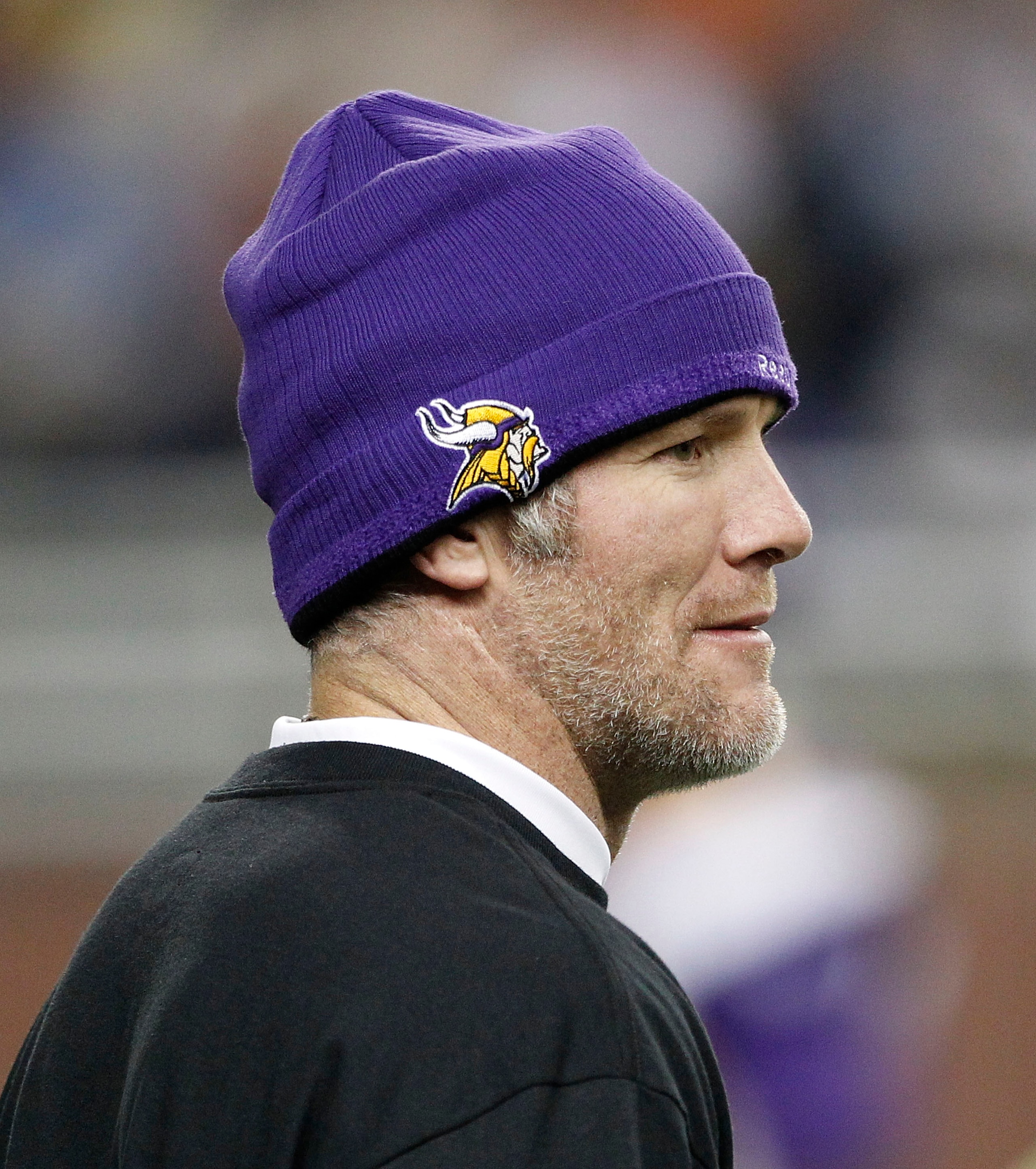 DETROIT, MI - DECEMBER 13:  Brett Favre #4 of the Green Bay Packers walks on the field during pre-game warm ups and will not dress for the game against the New York Giants on December 13, 2010 in Detroit, Michigan.  (Photo by Leon Halip/Getty Images)