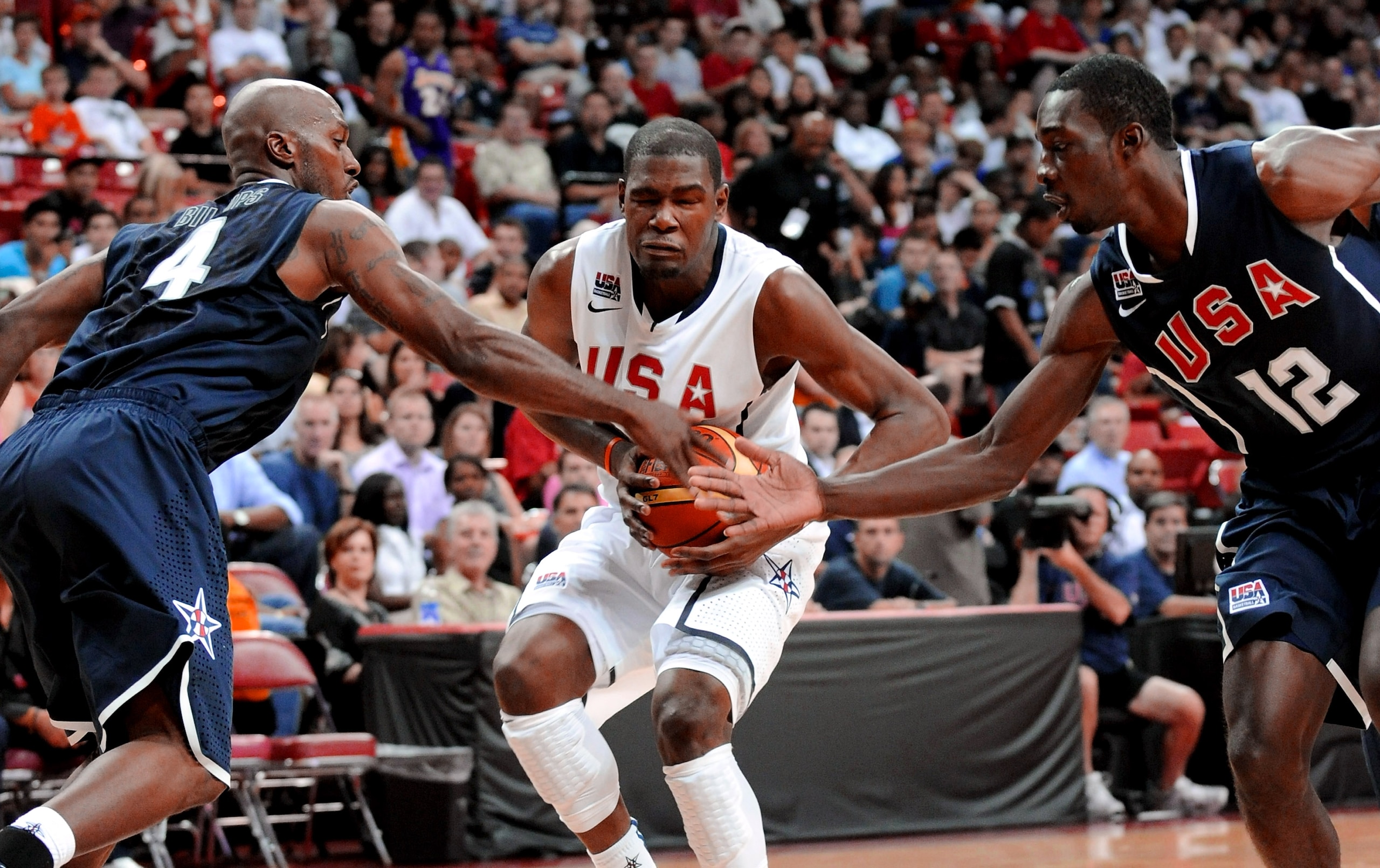 LAS VEGAS - JULY 24:  Chauncey Billups #4 and Jeff Green #12 of the 2010 USA Basketball Men's National Team try to stop Kevin Durant #5 of the 2010 USA Basketball Men's National Team during a USA Basketball showcase at the Thomas & Mack Center on July 24,