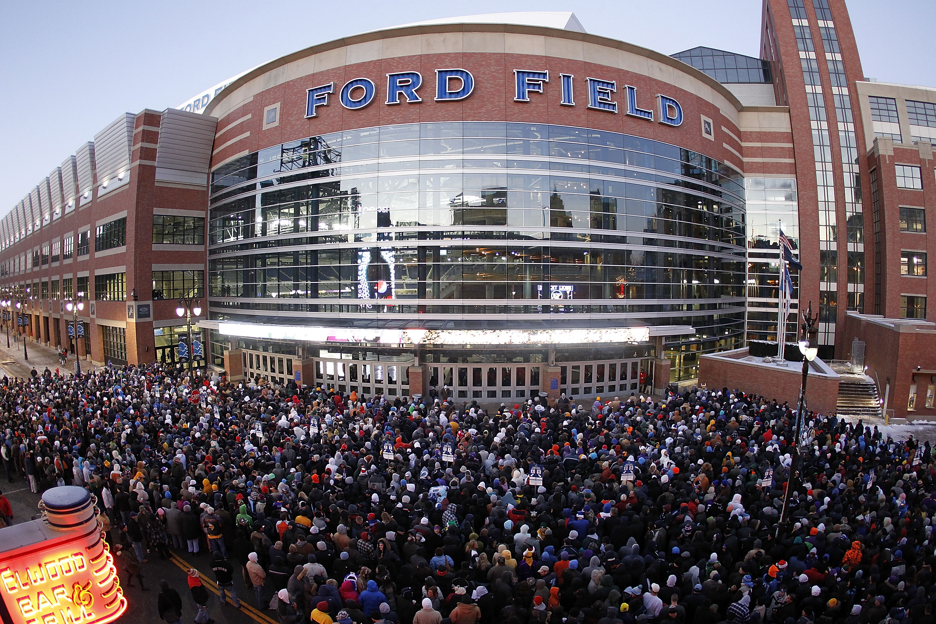 DETROIT, MI - DECEMBER 13: Football fans line up at Ford Field to enter the game between the New York Giants and the Minnesota Vikings on December 13, 2010 in Detroit, Michigan. (Photo by Leon Halip/Getty Images)