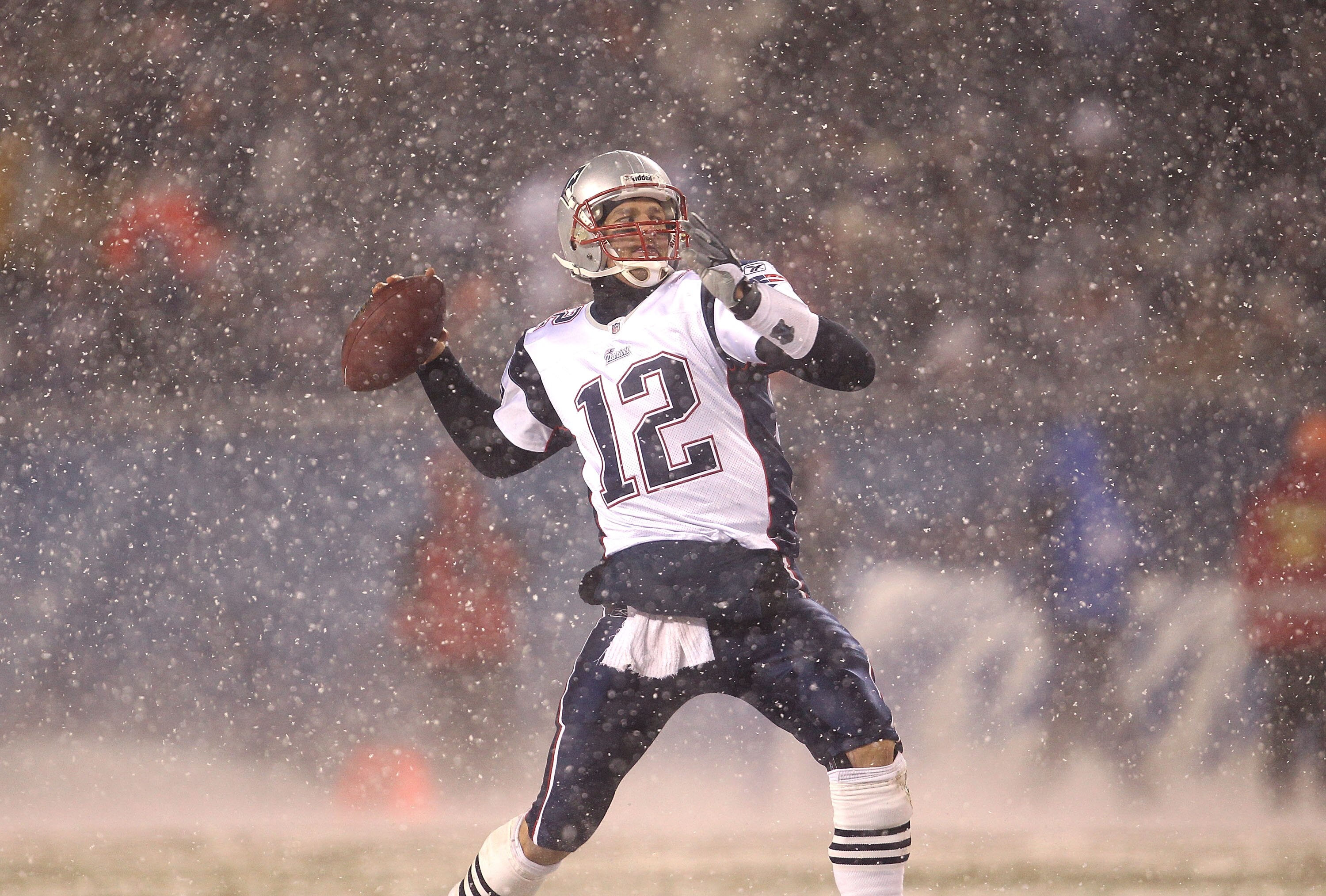 CHICAGO - DECEMBER 12: Tom Brady #12 of the New England Patriots throws a pass against the Chicago Bears at Soldier Field on December 12, 2010 in Chicago, Illinois. The Patriots defeated the Bears 36-7. (Photo by Jonathan Daniel/Getty Images)