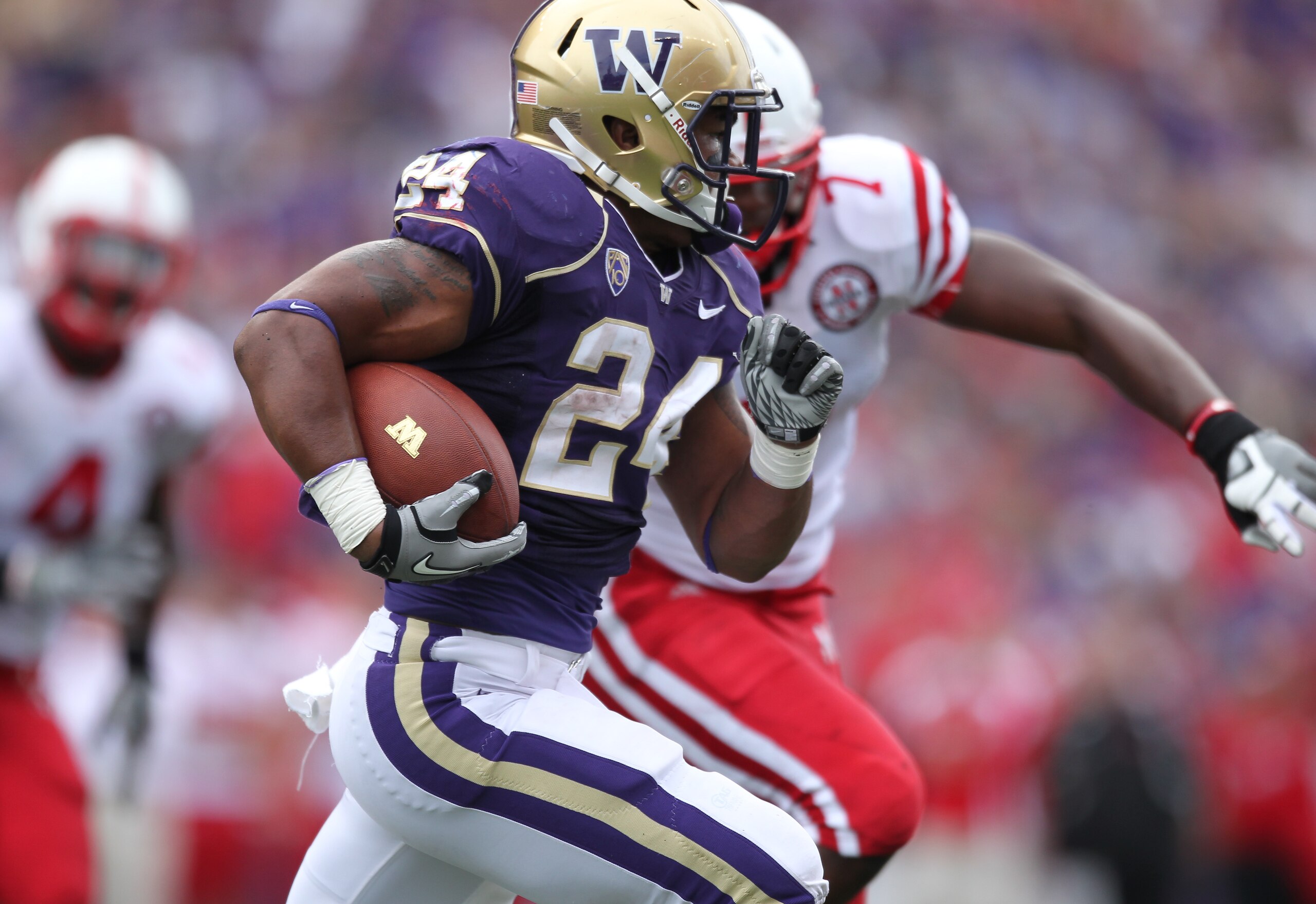 SEATTLE - SEPTEMBER 18: Running back Jesse Callier #24 of the Washington Huskies rushes against the Nebraska Cornhuskers on September 18, 2010 at Husky Stadium in Seattle, Washington. (Photo by Otto Greule Jr/Getty Images)