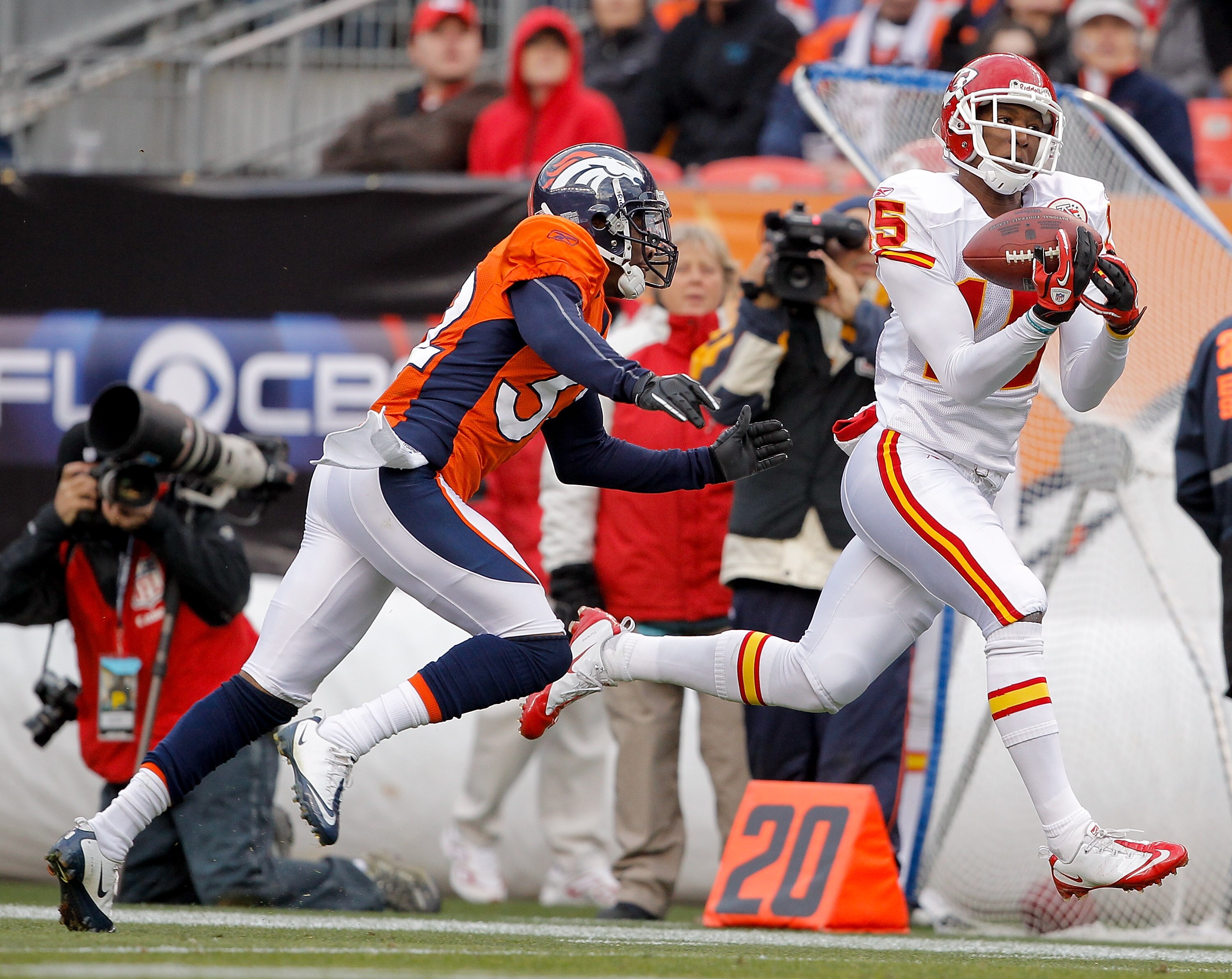 DENVER - NOVEMBER 14:  Wide receiver Verran Tucker #15 of the Kansas City Chiefs makes a reception against cornerback Perrish Cox #32 of the Denver Broncos during the second quarter at INVESCO Field at Mile High on November 14, 2010 in Denver, Colorado. (