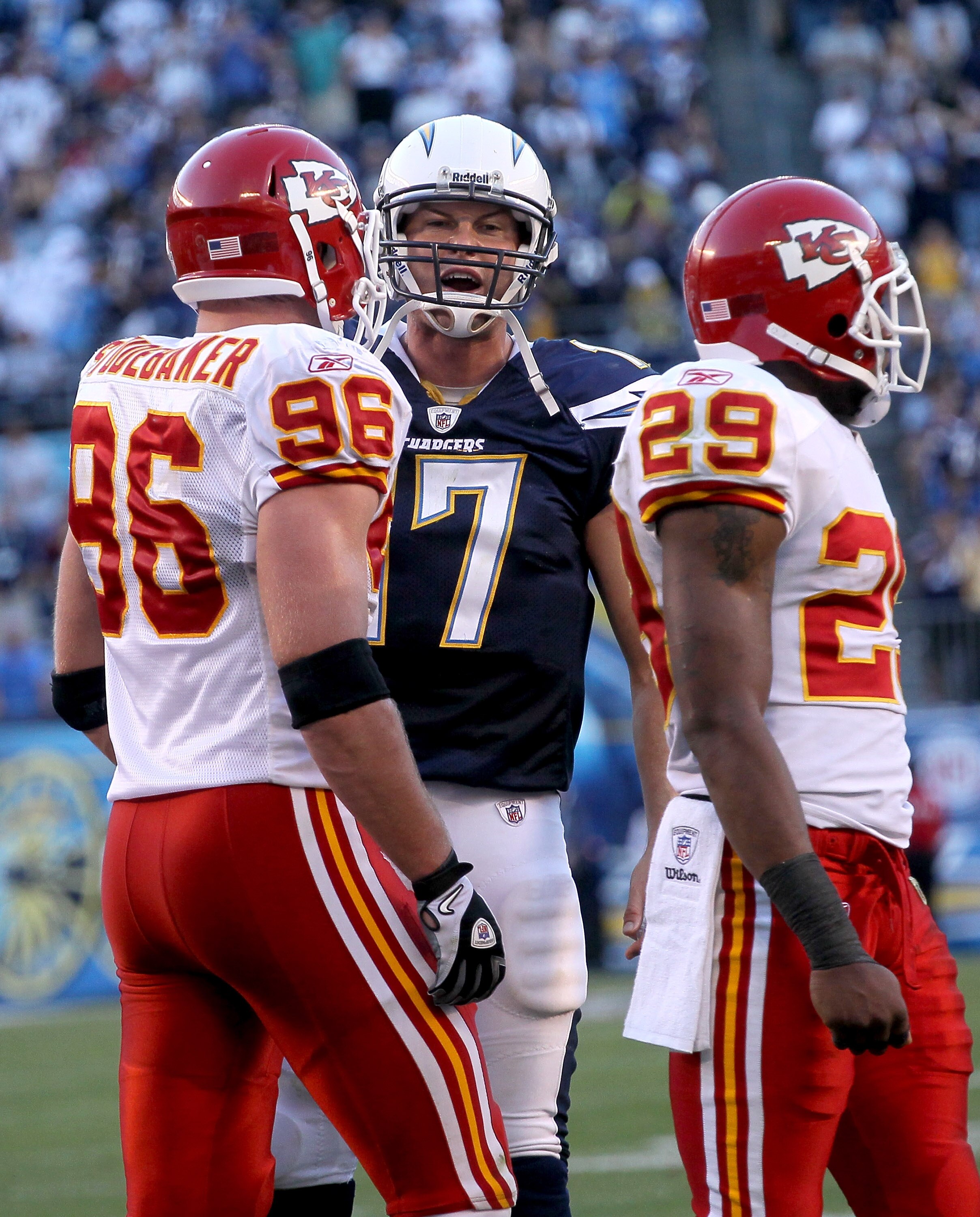 SAN DIEGO - DECEMBER 12:  Quarterbaqck Philip Rivers #17 of the San Diego Chargers talks to linebacker Andy Studebaker #96 and safety Eric Berry #29 of the Kansas City Chiefs after a Charger touchdown put them up 31-0 at Qualcomm Stadium on December 12, 2