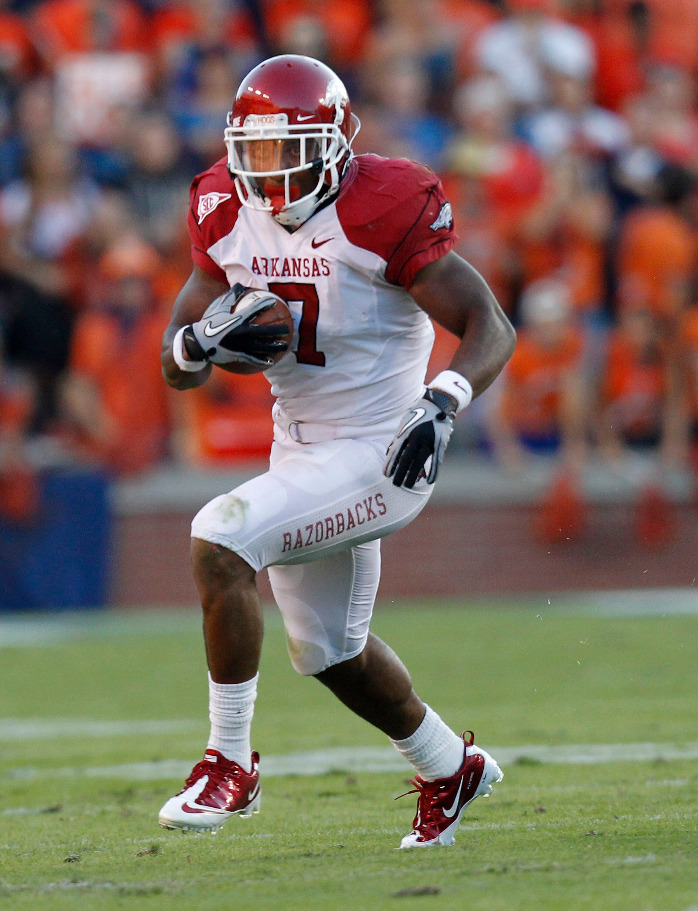 AUBURN, AL - OCTOBER 16:  Running back Knile Davis #7 of the Arkansas Razorbacks runs with the ball during the game against the Auburn Tigers at Jordan-Hare Stadium on October 16, 2010 in Auburn, Alabama.  The Tigers beat the Razorbacks 65-43.  (Photo by