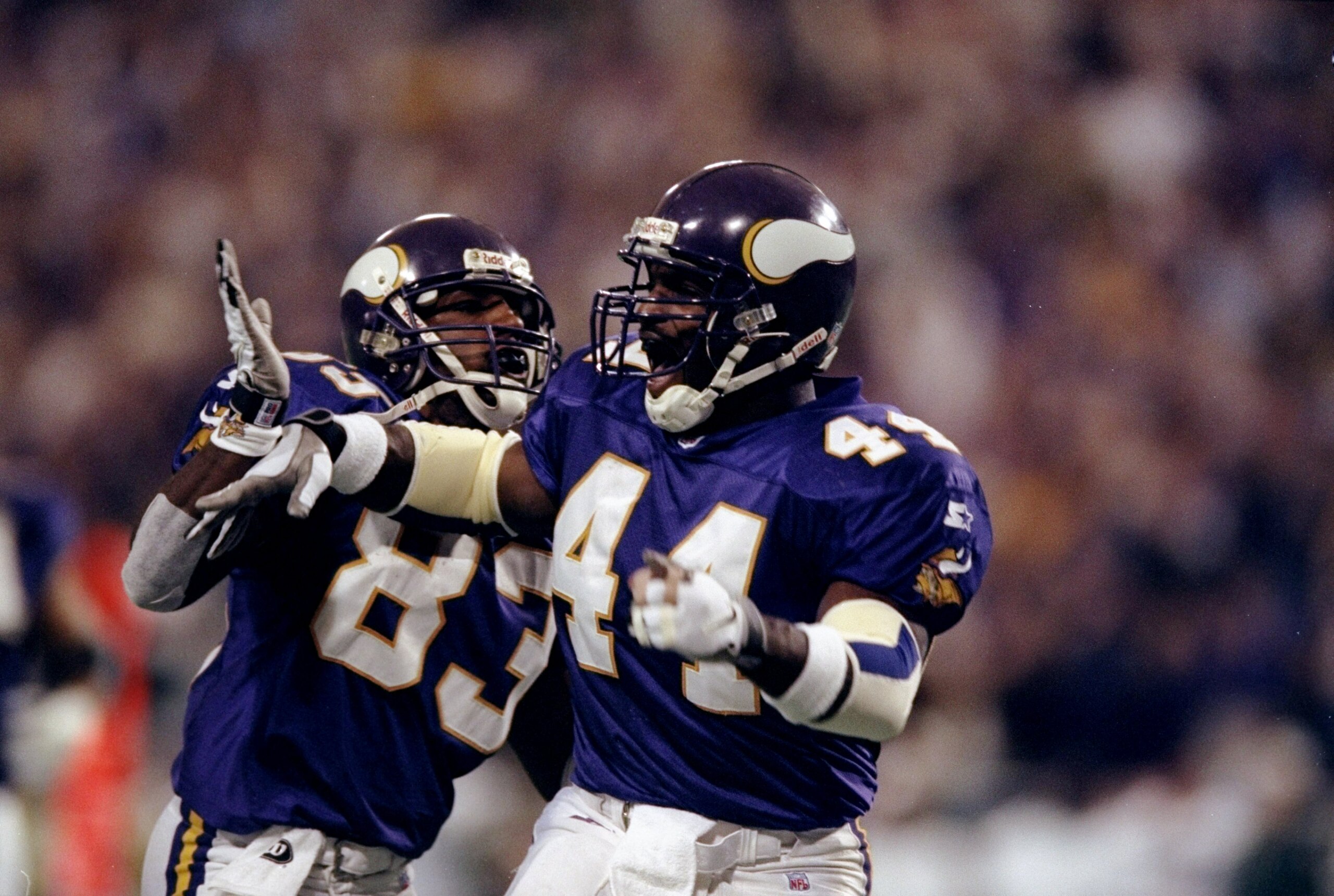 22 Nov 1998:  Running back Leroy Hoard #44 and wide receiver Robert Tate #83 of the Minnesota Vikings celebrate during the game against the Green Bay Packers at the HHH Metrodome in Minneapolis, Minnesota. The Vikings defeated the Packers 28-14. Mandatory