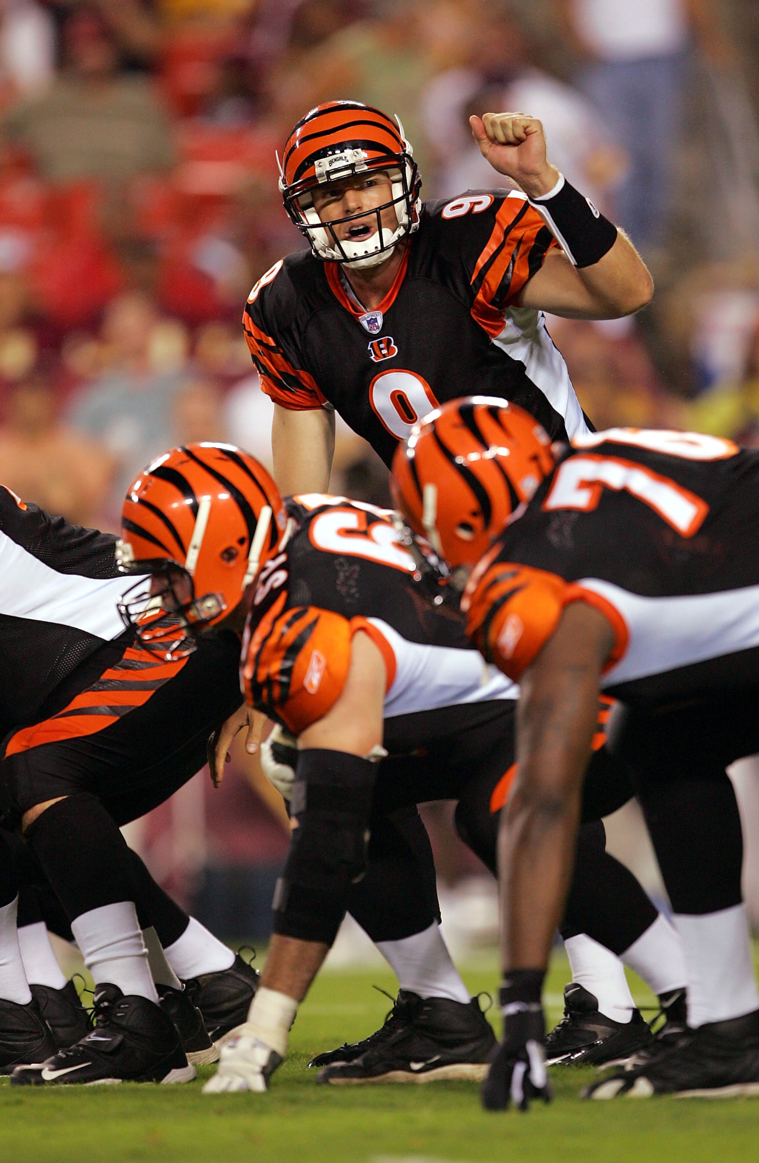LANDOVER, MD - AUGUST 19:  Quarterback Carson Palmer #9 of the Cincinnati Bengals signals at the line against the Washington Redskins during the first half of their preseason game on August 19, 2005 at FedEx Field in Landover, Maryland.  (Photo By Jamie S