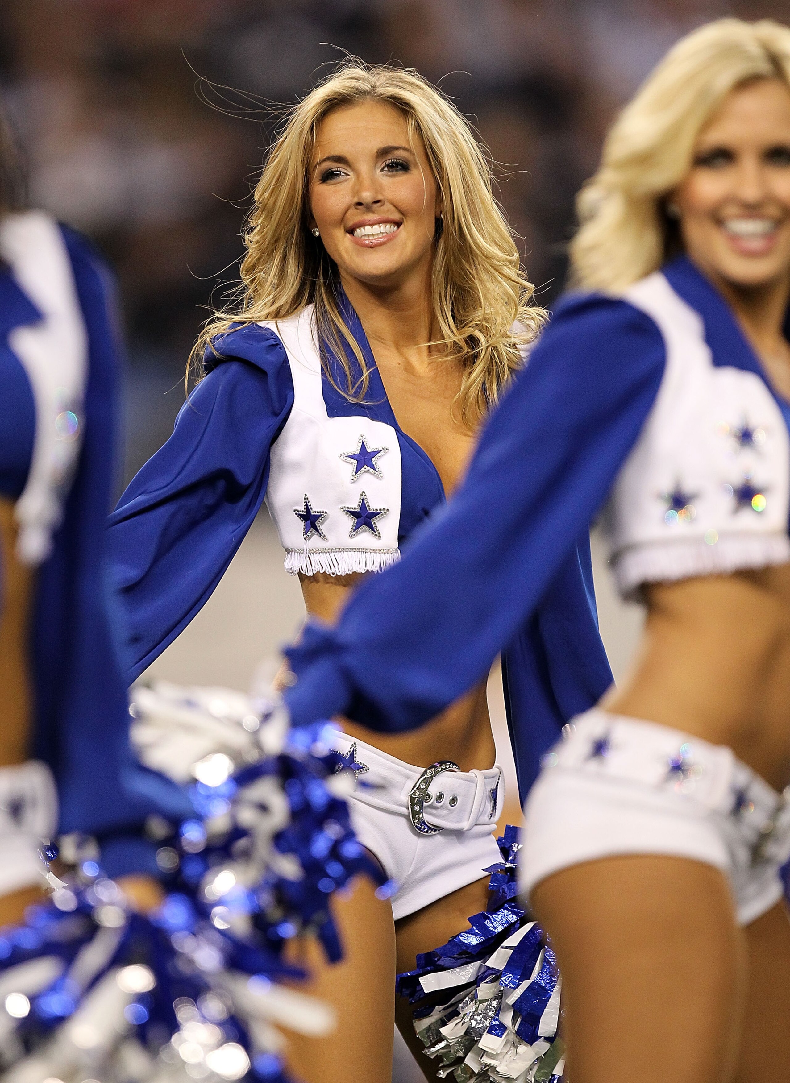 ARLINGTON, TX - DECEMBER 12:  A Dallas Cowboys cheerleader performs at Cowboys Stadium on December 12, 2010 in Arlington, Texas.  (Photo by Ronald Martinez/Getty Images)