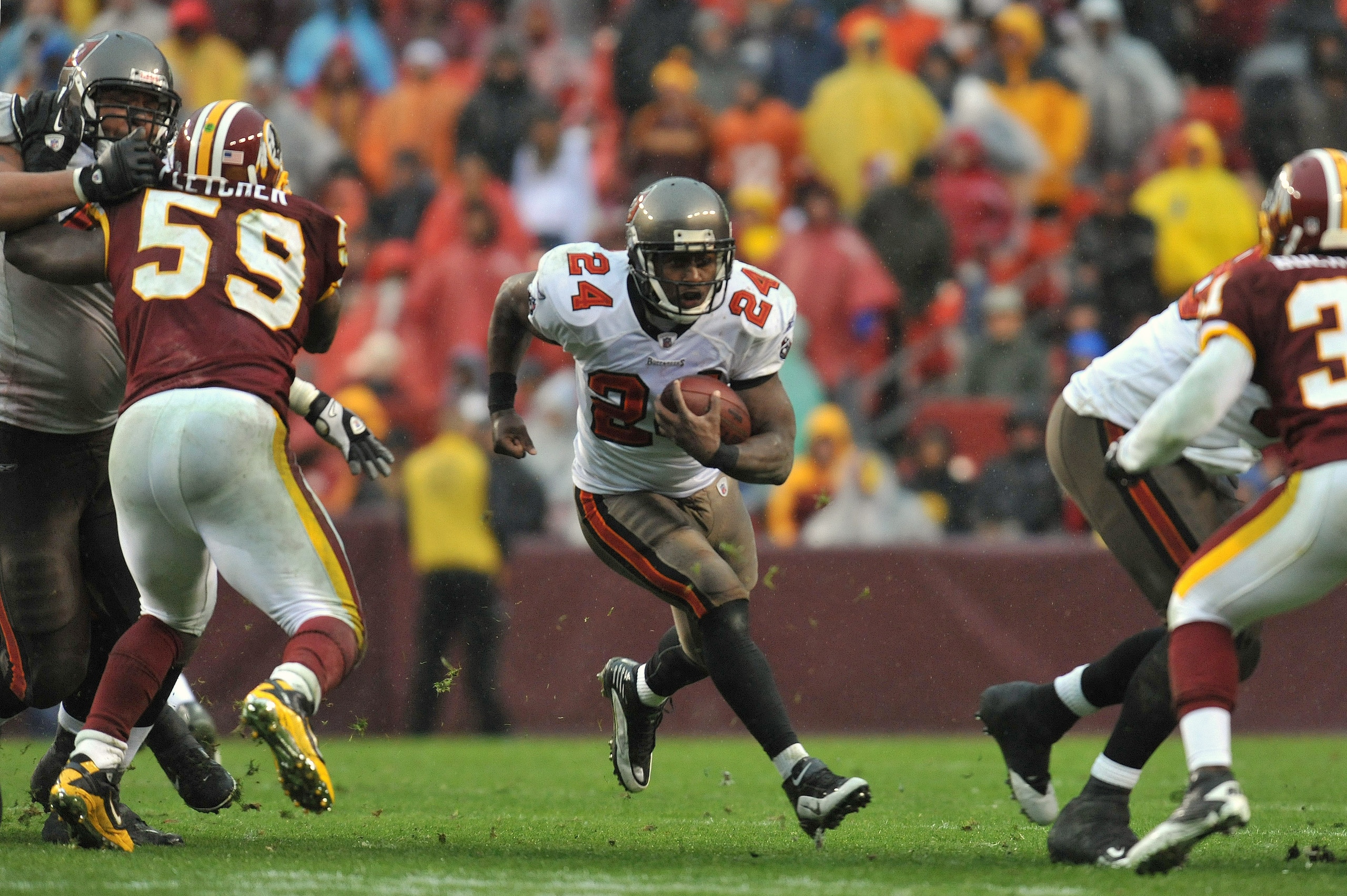 LANDOVER, MD - DECEMBER 12:  Carnell Williams #24 of the Tampa Bay Buccaneers runs the ball against the Washington Redskins  at FedExField on December 12, 2010 in Landover, Maryland. The Buccaneers defeated the Redskins 17-16. (Photo by Larry French/Getty