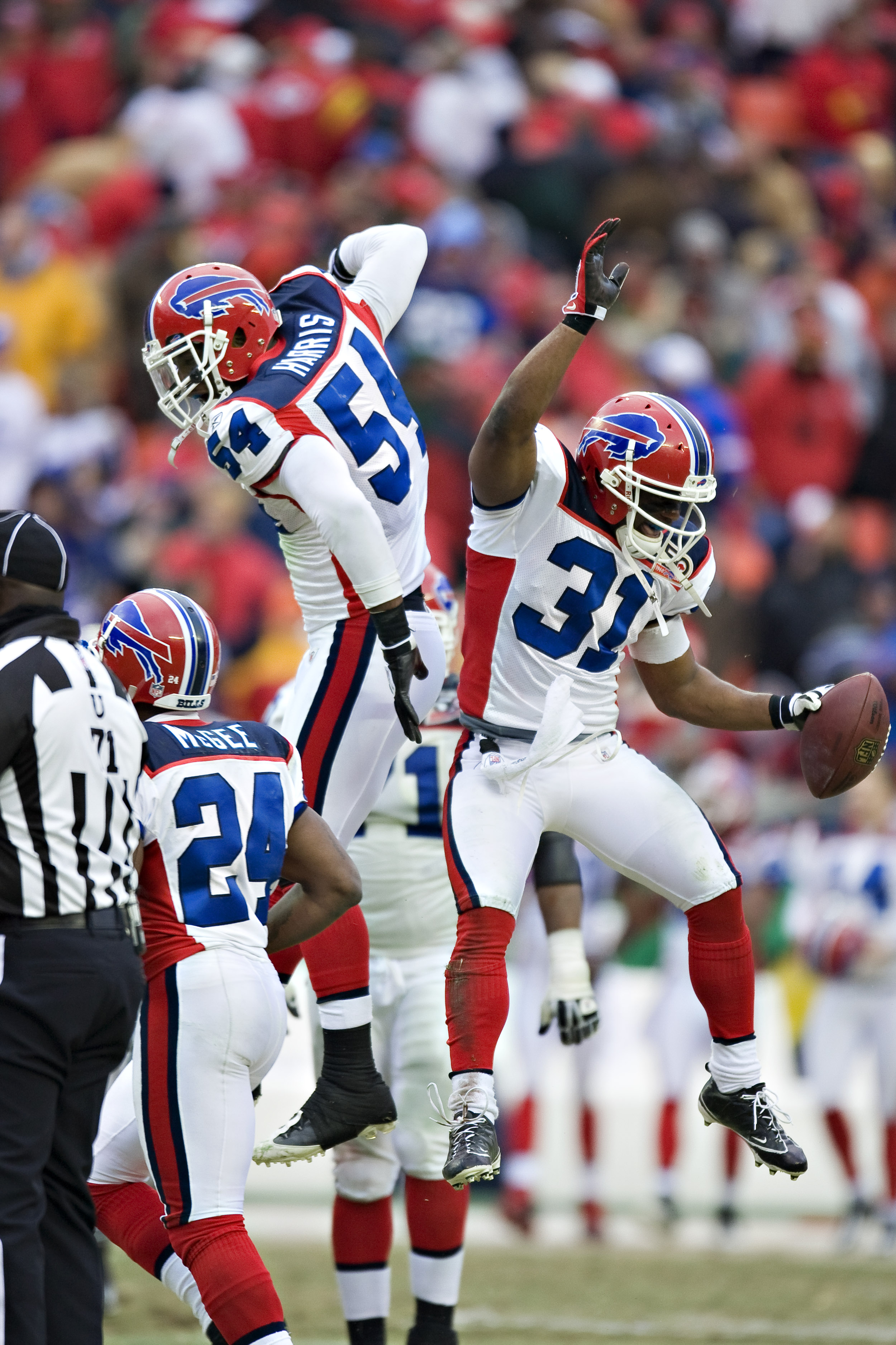 KANSAS CITY, MO - DECEMBER 13: Defensive back Jairus Byrd #31 and linebacker Nic Harris #54 of the Buffalo Bills celebrate after making a interception against the Kansas City Chiefs at Arrowhead Stadium on December 13, 2009 Kansas City, Missouri.  The Bil