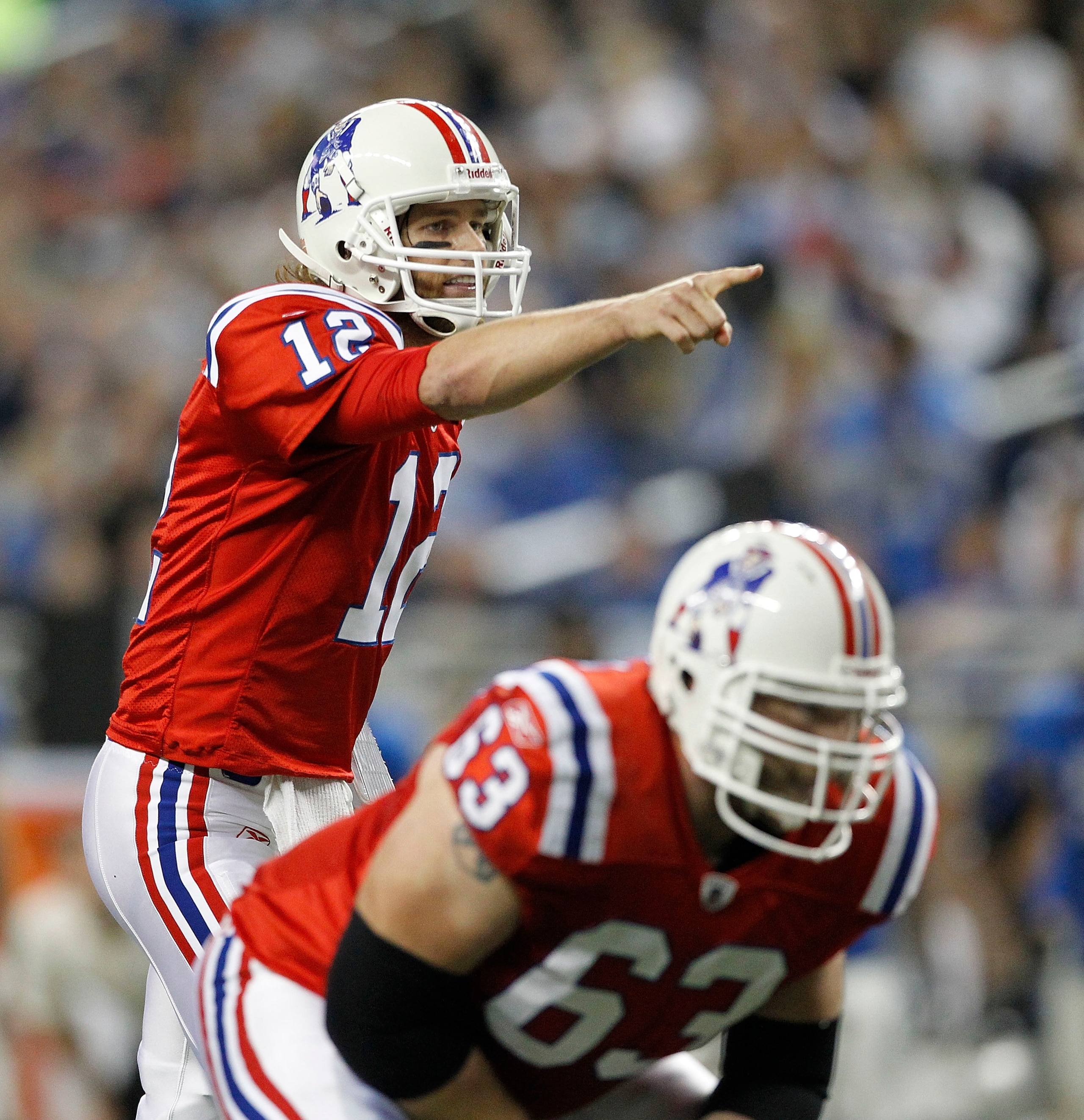 DETROIT - NOVEMBER 25: Tom Brady #12 of the New England Patriots gestures during the first quarter of the game at Ford Field on November 25, 2010 in Detroit, Michigan.  (Photo by Leon Halip/Getty Images)