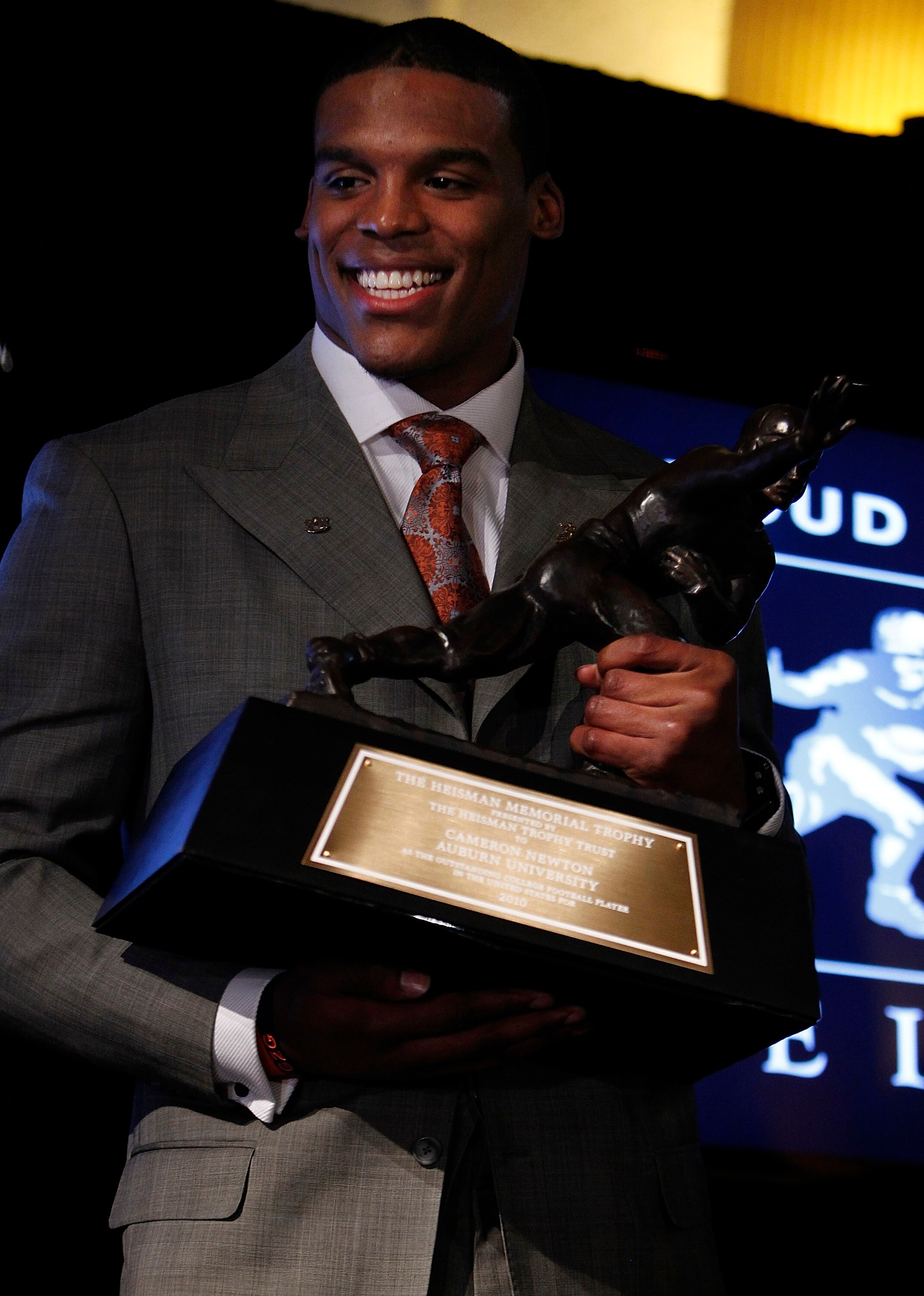 NEW YORK - DECEMBER 11:  Cam Newton, quarterback of the Auburn University Tigers, speaks after being awarded the 2010 Heisman Memorial Trophy Award on December 11, 2010 in New York City.  (Photo by Jeff Zelevansky/Getty Images)