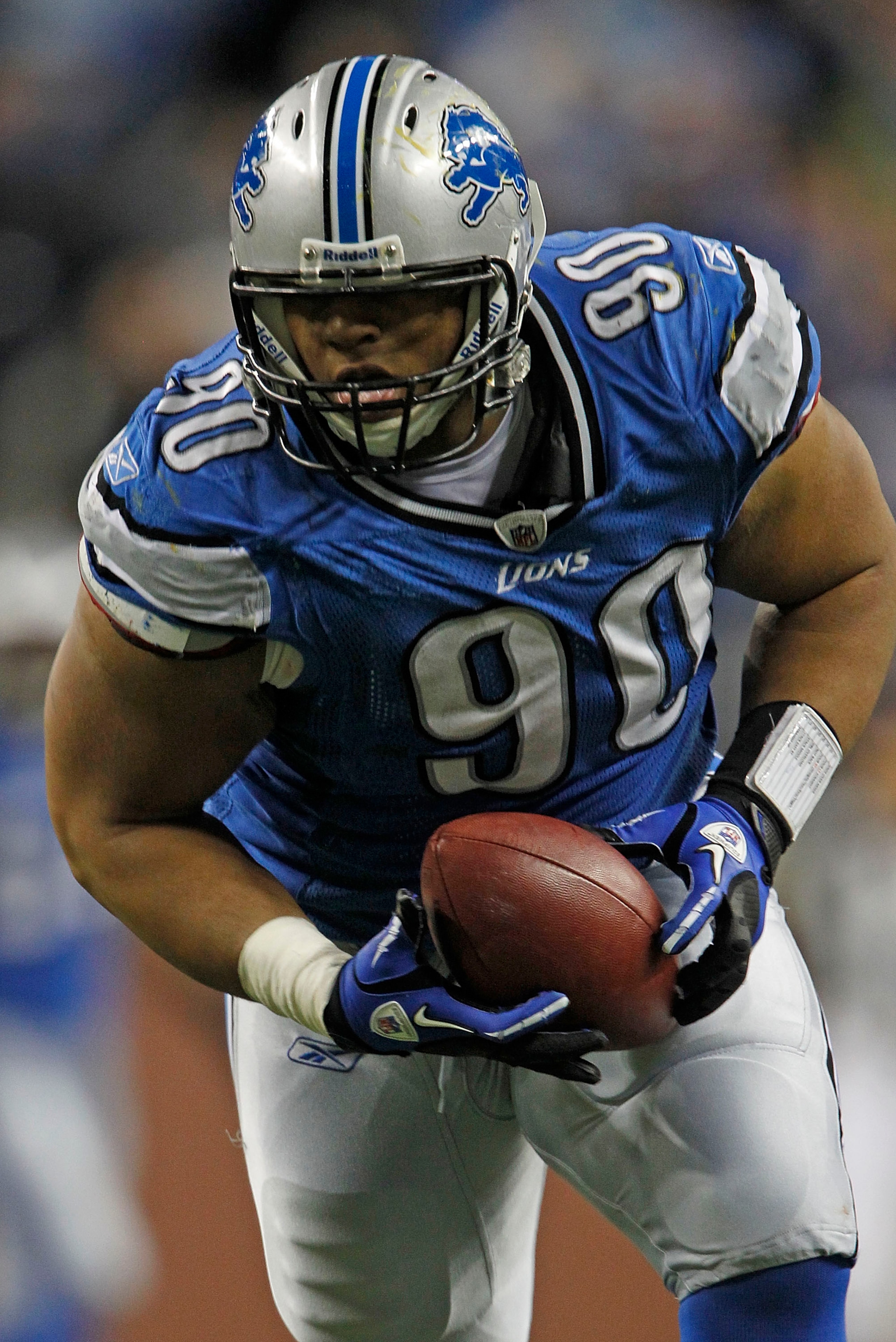 DETROIT - OCTOBER 31:  Ndamukong Suh #90 of the Detroit Lions recovers a late fourth quarter fumble from Rex Grossman #8 of the Washington Redskins an scores a touchdown at Ford Field on October 31, 2010 in Detroit, Michigan. The Lions defeated the Redski