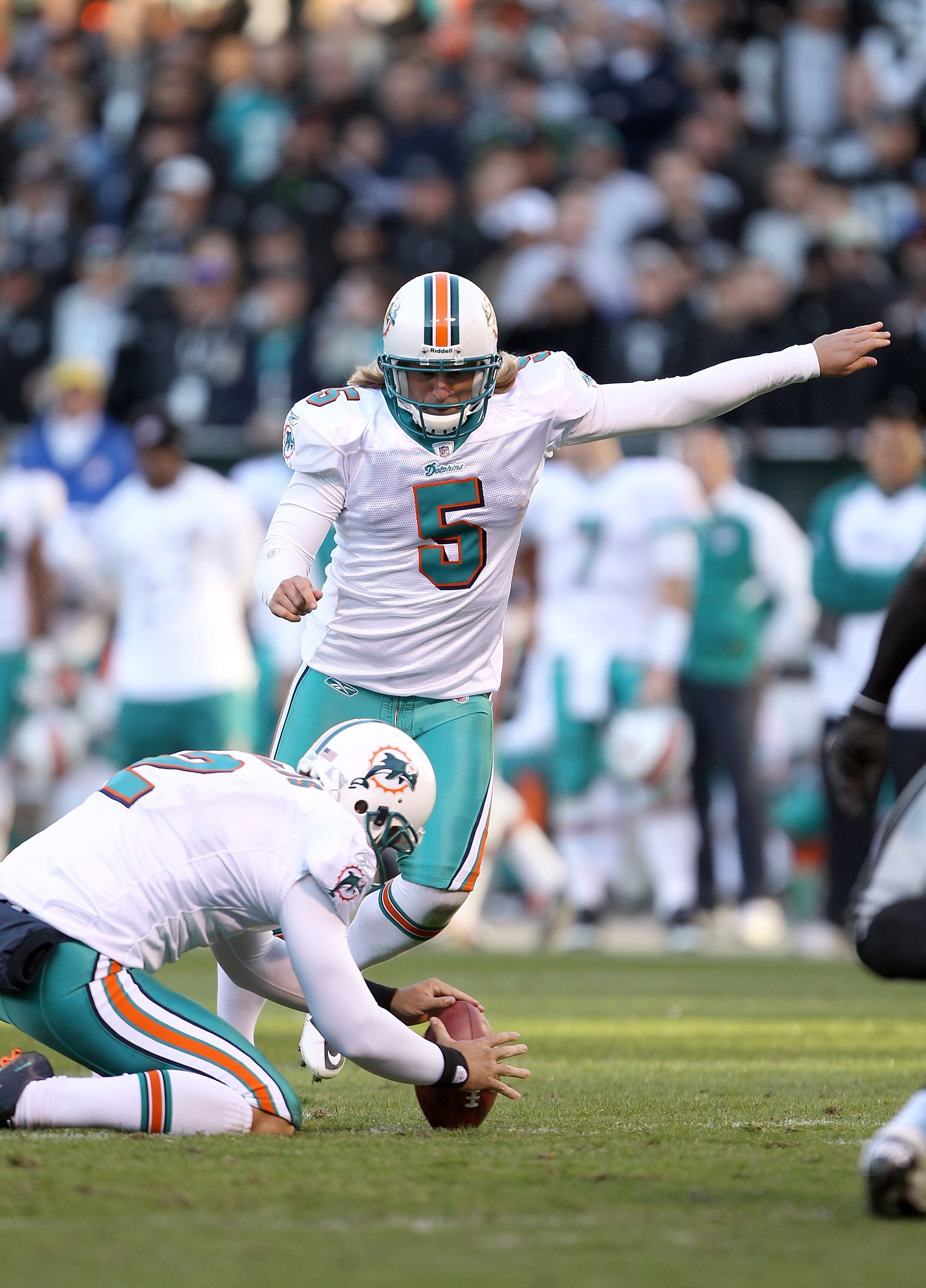 OAKLAND, CA - NOVEMBER 28:  Dan Carpenter #5 of the Miami Dolphins in action against the Oakland Raiders at Oakland-Alameda County Coliseum on November 28, 2010 in Oakland, California.  (Photo by Ezra Shaw/Getty Images)