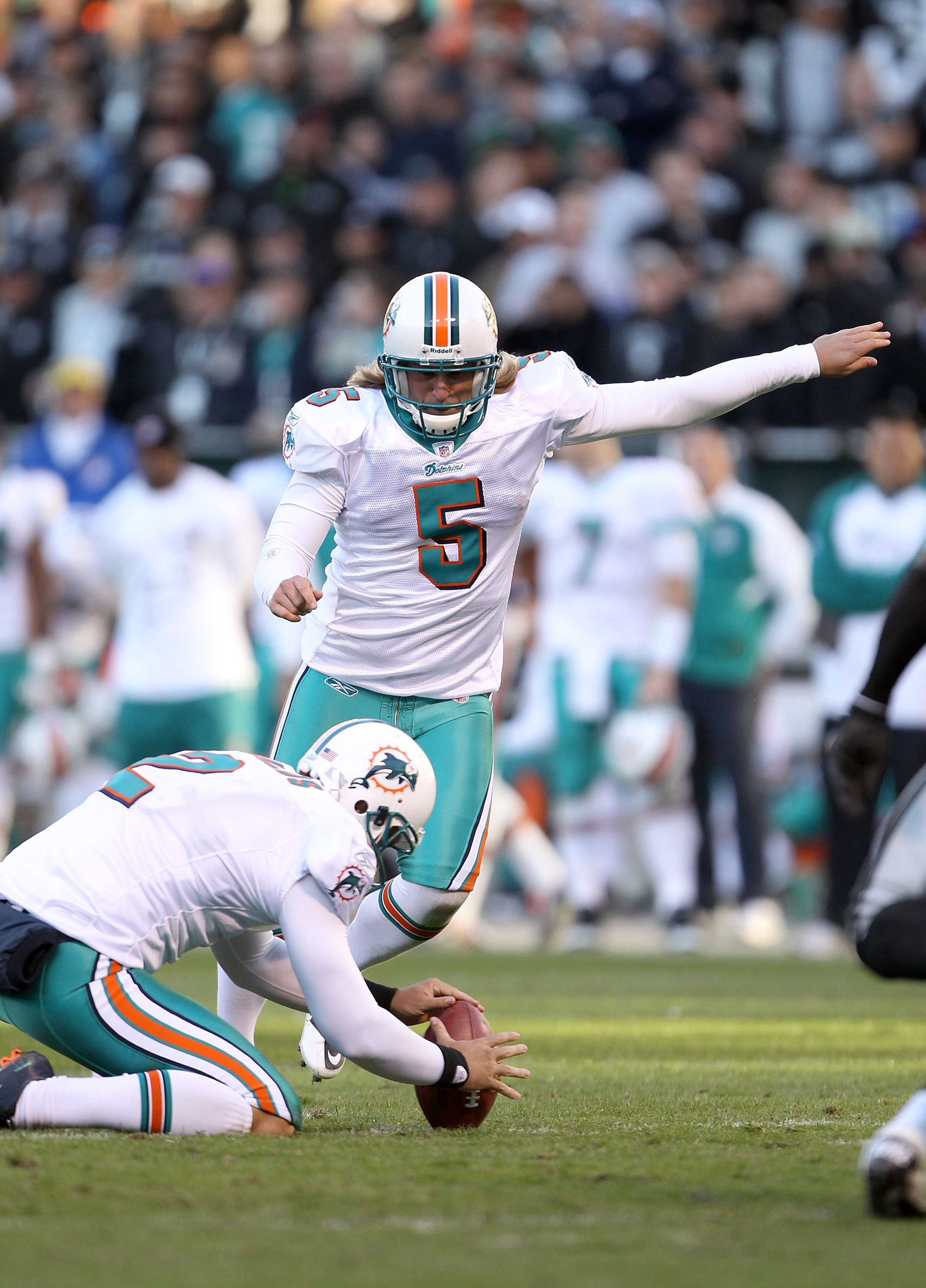 OAKLAND, CA - NOVEMBER 28:  Dan Carpenter #5 of the Miami Dolphins in action against the Oakland Raiders at Oakland-Alameda County Coliseum on November 28, 2010 in Oakland, California.  (Photo by Ezra Shaw/Getty Images)