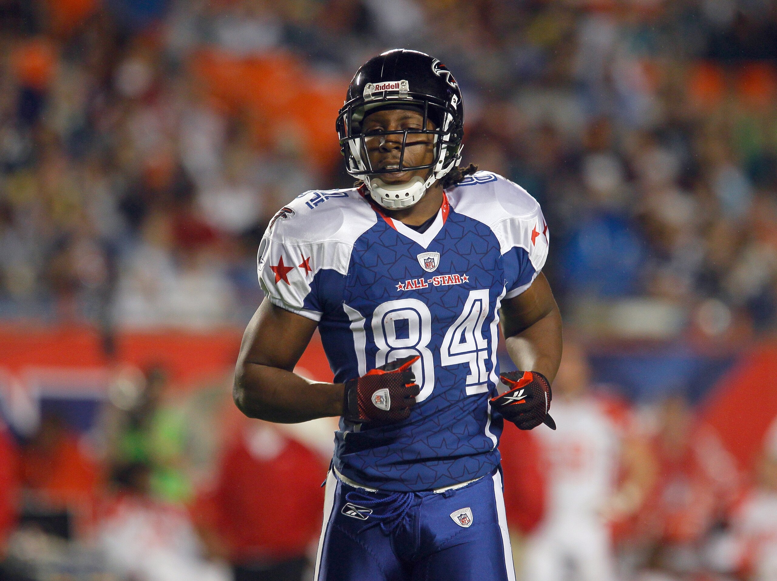 MIAMI GARDENS, FL - JANUARY 31:  Roddy White #84 of the NFC's Atlanta Falcons jogs into position during the 2010 AFC-NFC Pro Bowl game at Sun Life Stadium on January 31, 2010 in Miami Gardens, Florida. The AFC defeated the NFC 41-34. (Photo by Scott Halle