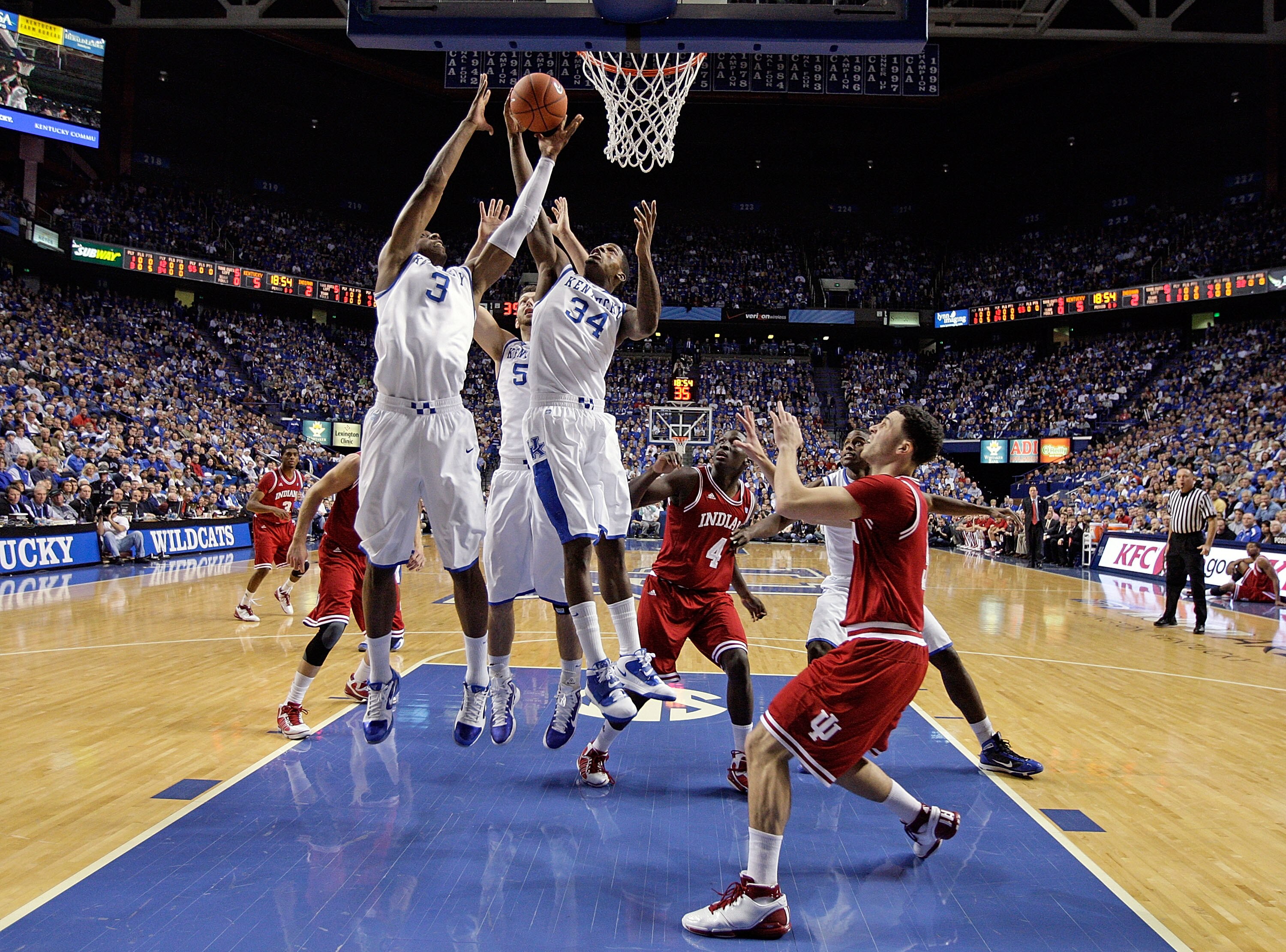 LEXINGTON, KY - DECEMBER 11:  Terrence Jones #3 and DeAndre Liggins #32 of the Kentucky Wildcats grab a rebound during the 81-62 victory over the Indiana Hoosiers on December 11, 2010 in Lexington, Kentucky.  (Photo by Andy Lyons/Getty Images)