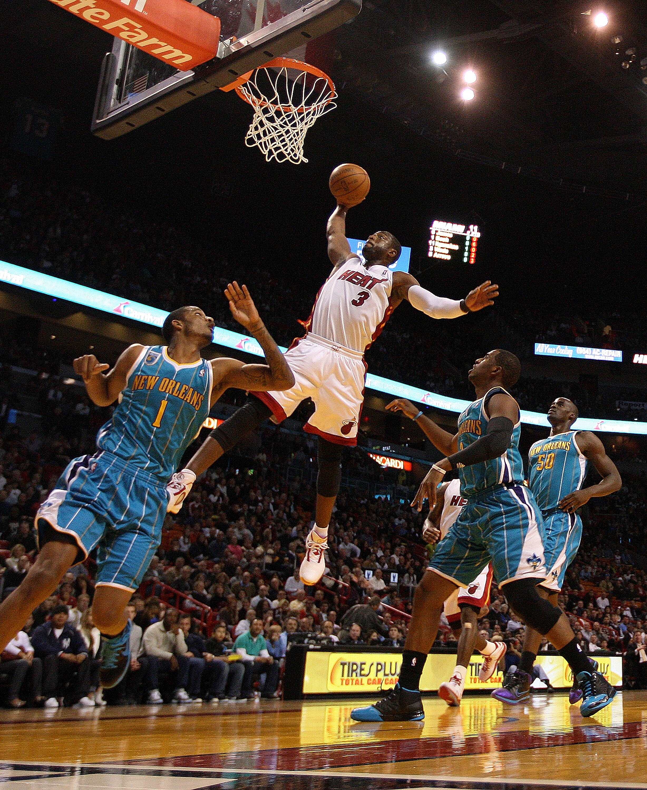 MIAMI, FL - DECEMBER 13:  Dwyane Wade #3 of the Miami Heat drives to the hoop during a game against the New Orleans Hornets at American Airlines Arena on December 13, 2010 in Miami, Florida. NOTE TO USER: User expressly acknowledges and agrees that, by do