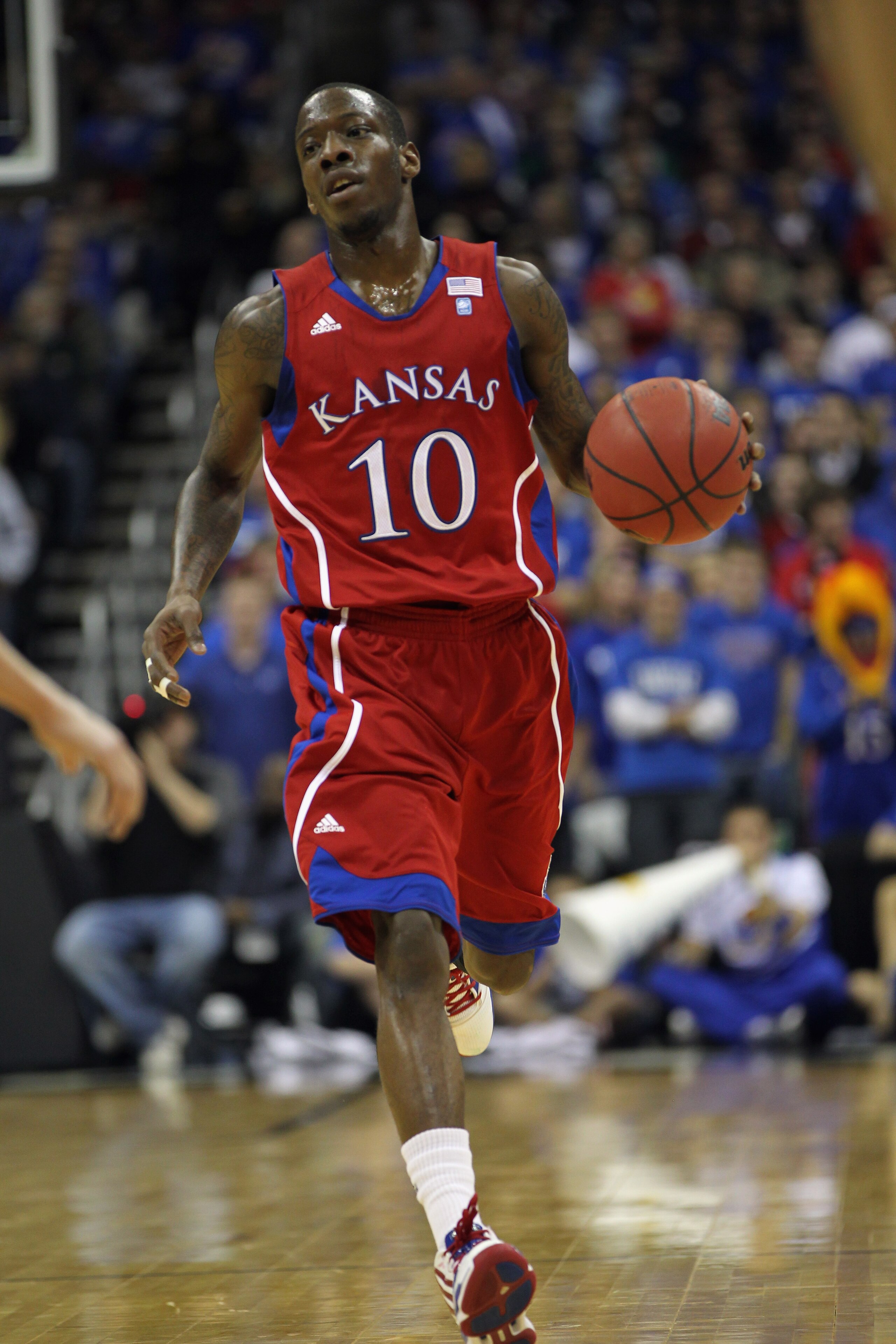 KANSAS CITY, MO - DECEMBER 11:  Tyshawn Taylor #10 of the Kansas Jayhawks in action during the game against the Colorado State Rams on December 11, 2010 at the Sprint Center in Kansas City, Missouri.  (Photo by Jamie Squire/Getty Images)