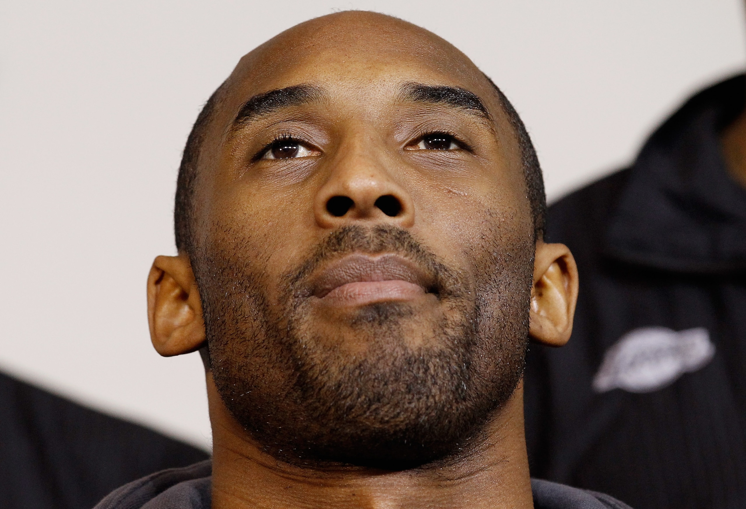 WASHINGTON, DC - DECEMBER 13:  (AFP OUT) Guard Kobe Bryant of the Los Angeles Lakers participates in an event honoring the 2010 NBA Champions at the Boys and Girls Club at THEARC December 13, 2010 in Washington, DC. The Lakers team volunteered on projects