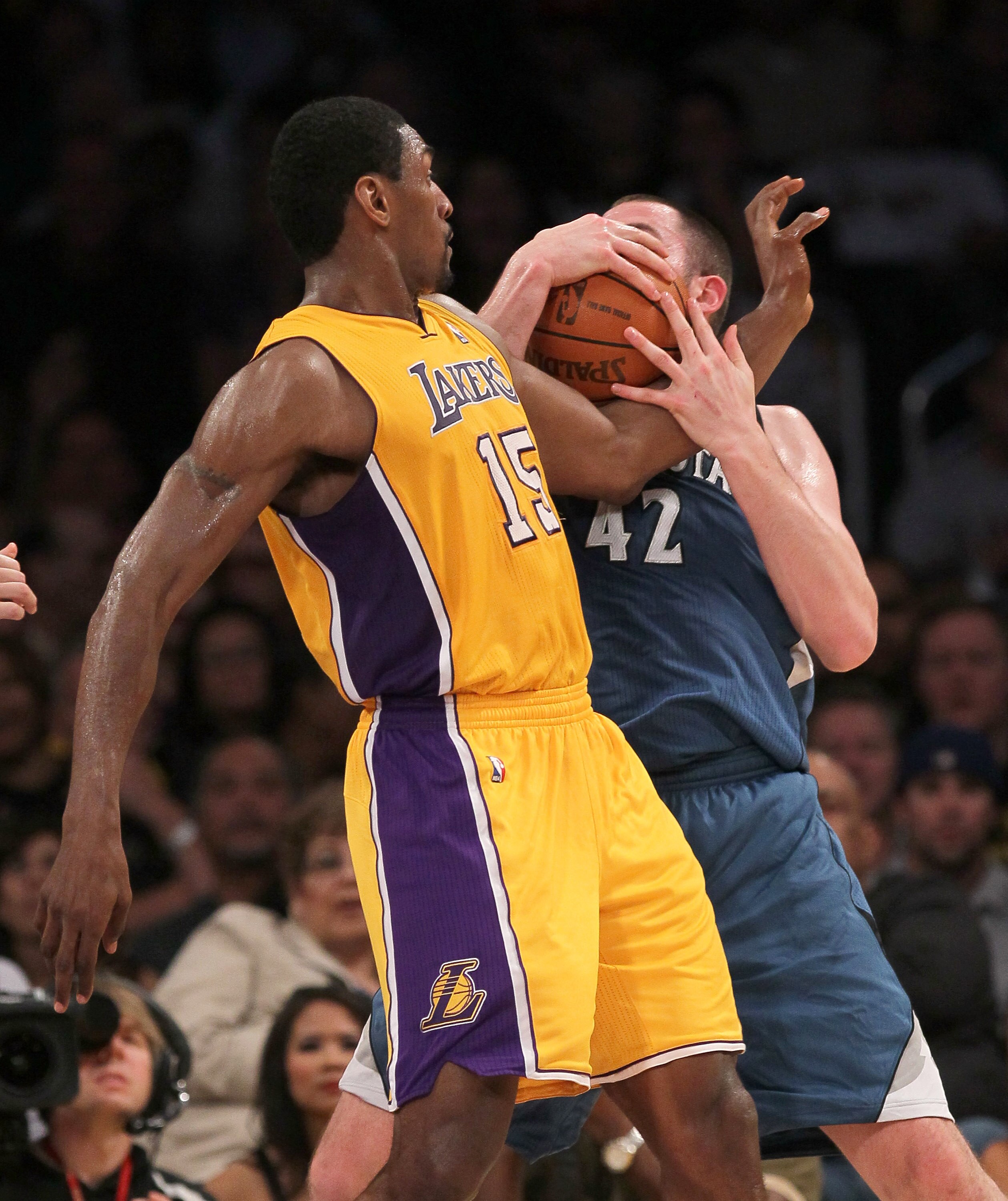 LOS ANGELES - NOVEMBER 9: Ron Artest #15 of the Los Angeles Lakers battles for a loose ball with Kevin Love #42 of the Minnesota Timberwolves at Staples Center on November 9, 2010 in Los Angeles, California.  The Lakers won 99-94.  NOTE TO USER: User expr