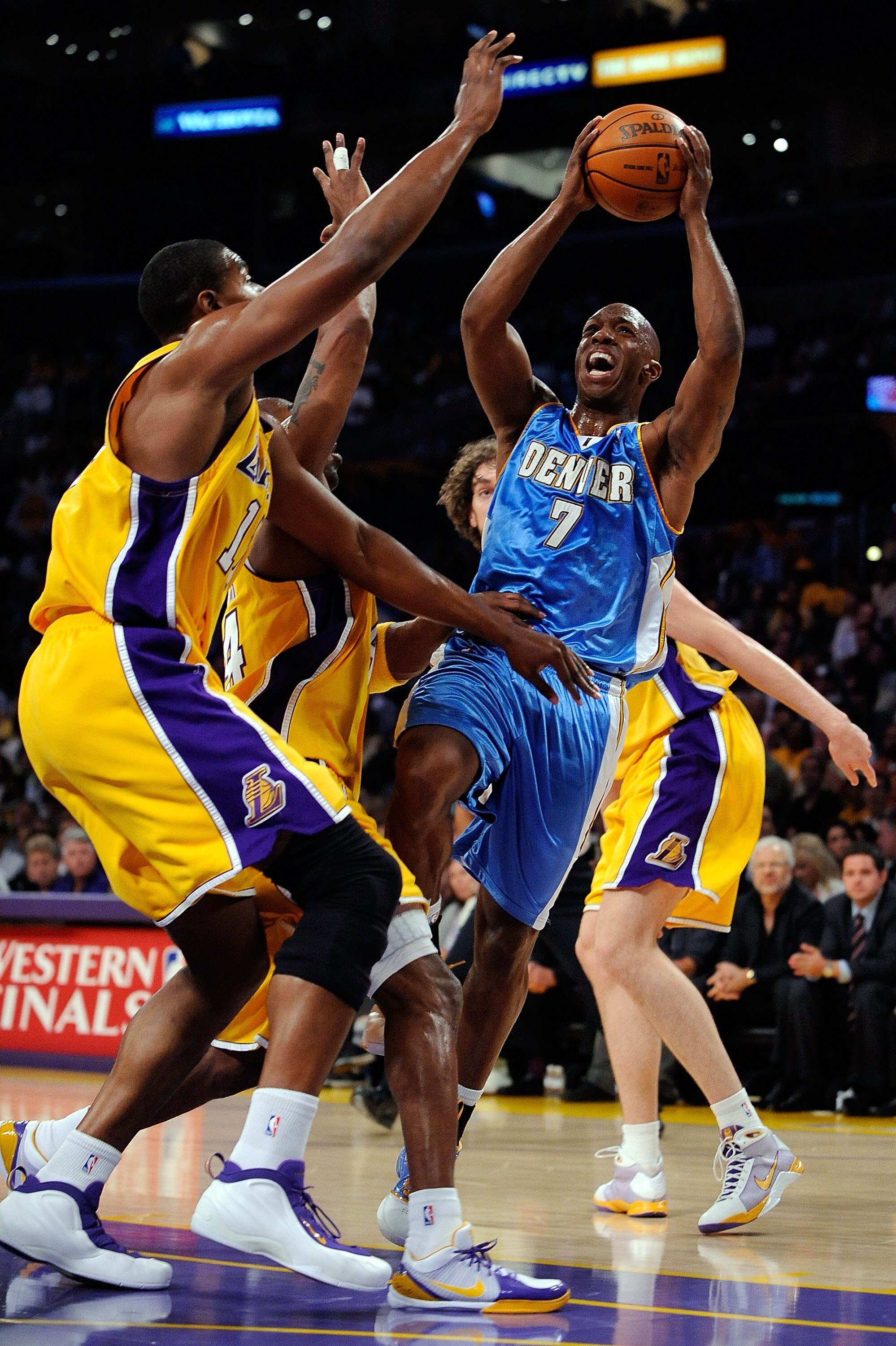 LOS ANGELES, CA - MAY 21:  Chauncey Billups #7 of the Denver Nuggets goes up for a shot over Andrew Bynum #17 and Kobe Bryant #24 of the Los Angeles Lakers in the first half in Game Two of the Western Conference Finals during the 2009 NBA Playoffs at Stap