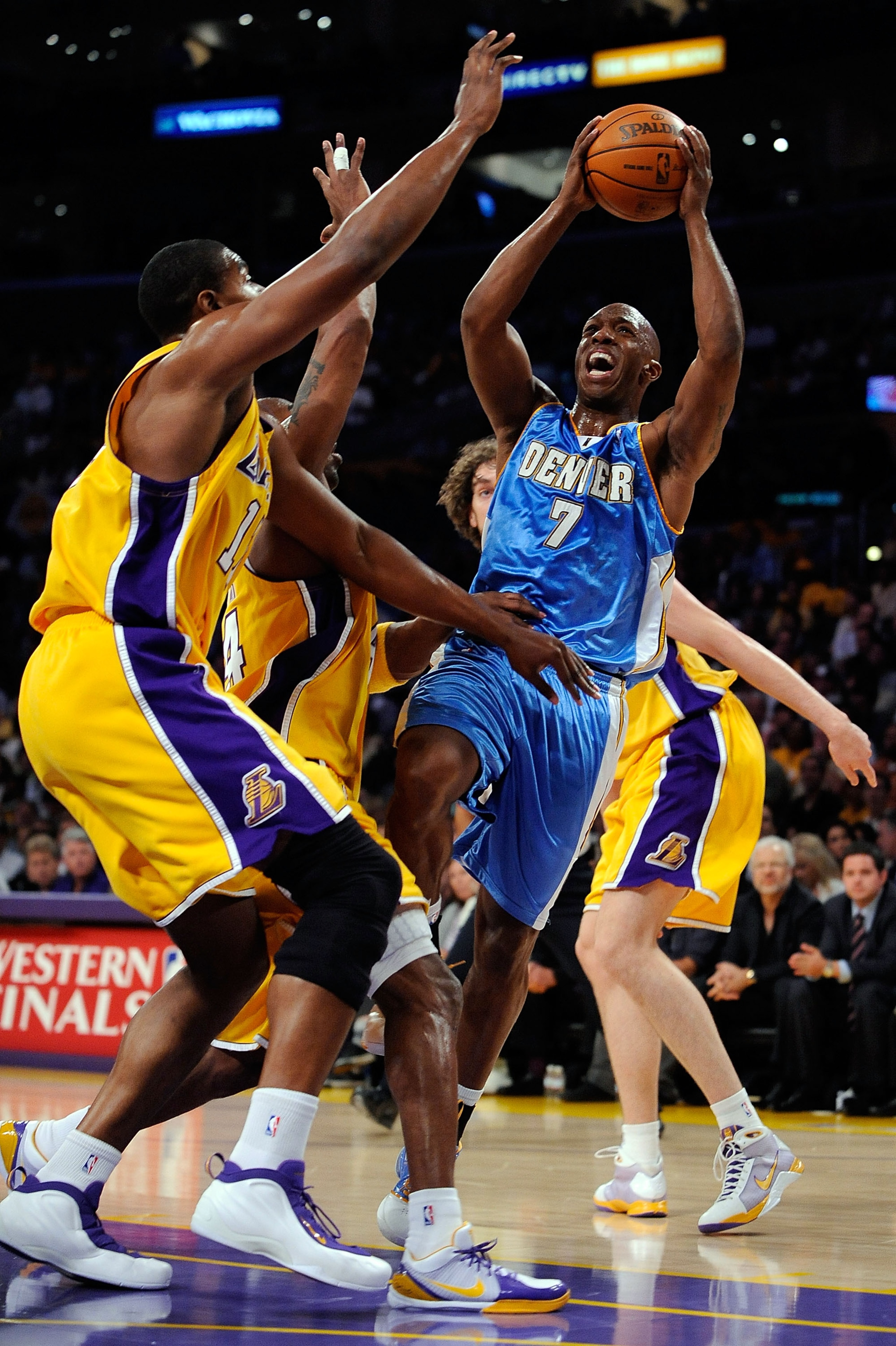 LOS ANGELES, CA - MAY 21:  Chauncey Billups #7 of the Denver Nuggets goes up for a shot over Andrew Bynum #17 and Kobe Bryant #24 of the Los Angeles Lakers in the first half in Game Two of the Western Conference Finals during the 2009 NBA Playoffs at Stap