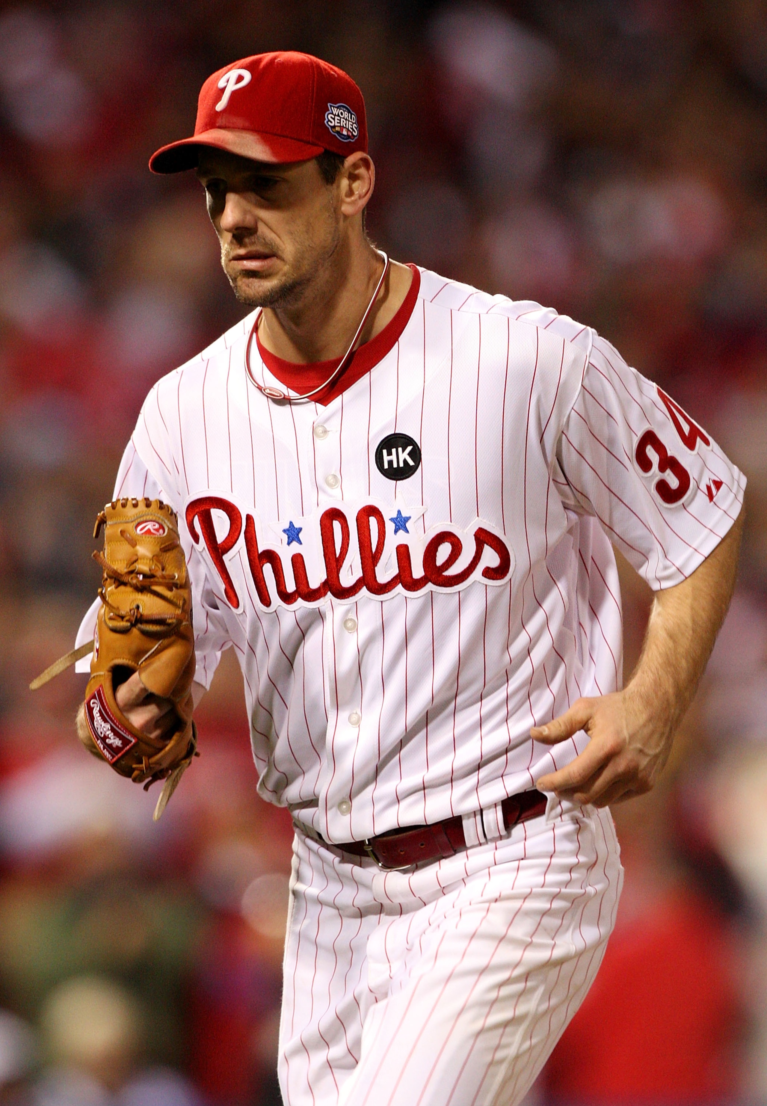 PHILADELPHIA - NOVEMBER 02:  Cliff Lee #34 of the Philadelphia Phillies runs back to the dugout after he was taken out of the game in the bottom of the eighth innning against the New York Yankees in Game Five of the 2009 MLB World Series at Citizens Bank