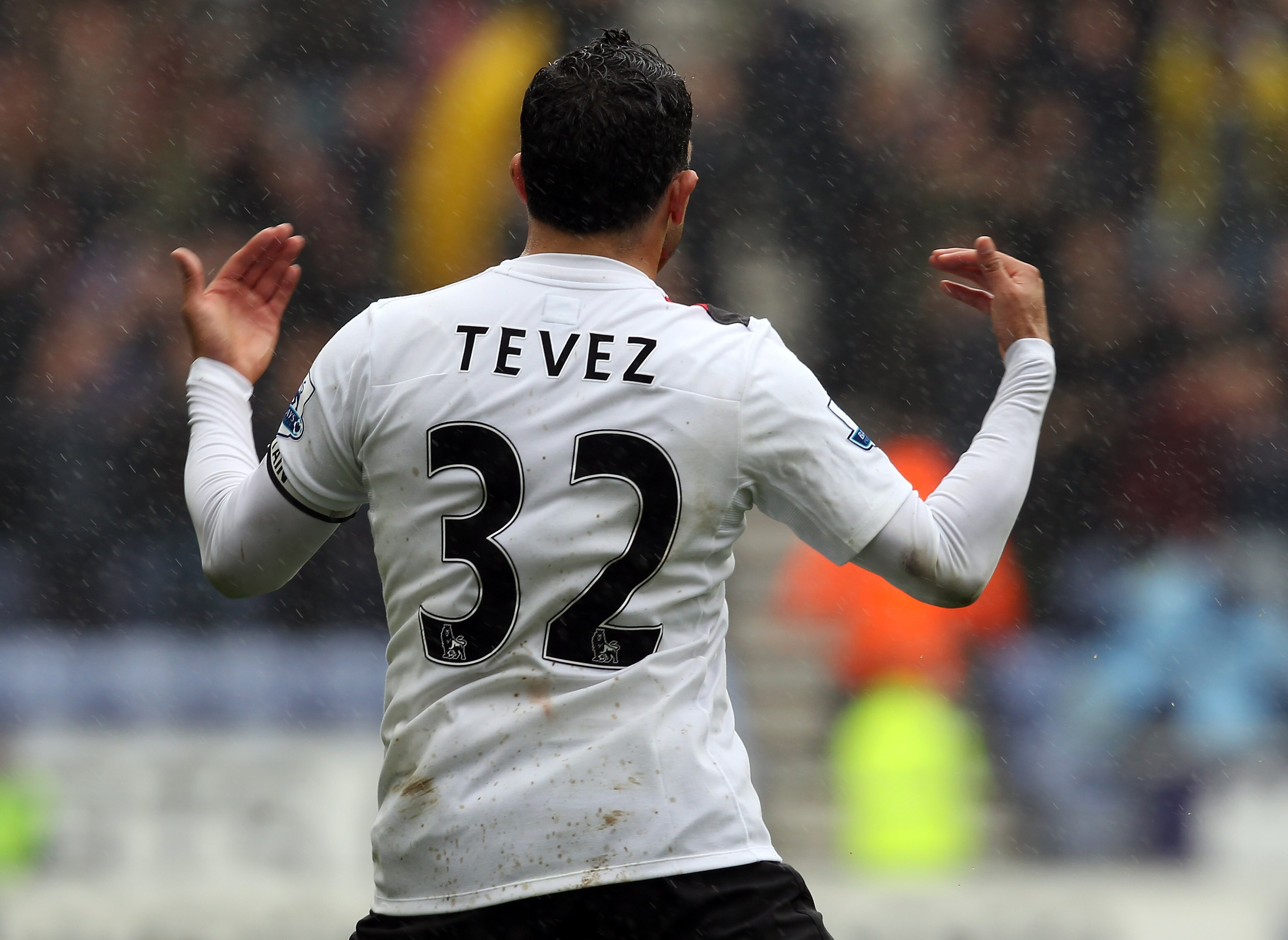 WIGAN, ENGLAND - SEPTEMBER 19:  Carlos Tevez of Manchester City celebrates after scoring the opening goal during the Barclays Premiership match between Wigan Athletic and Manchester City at the DW Stadium on September 19, 2010 in Wigan, England.  (Photo b