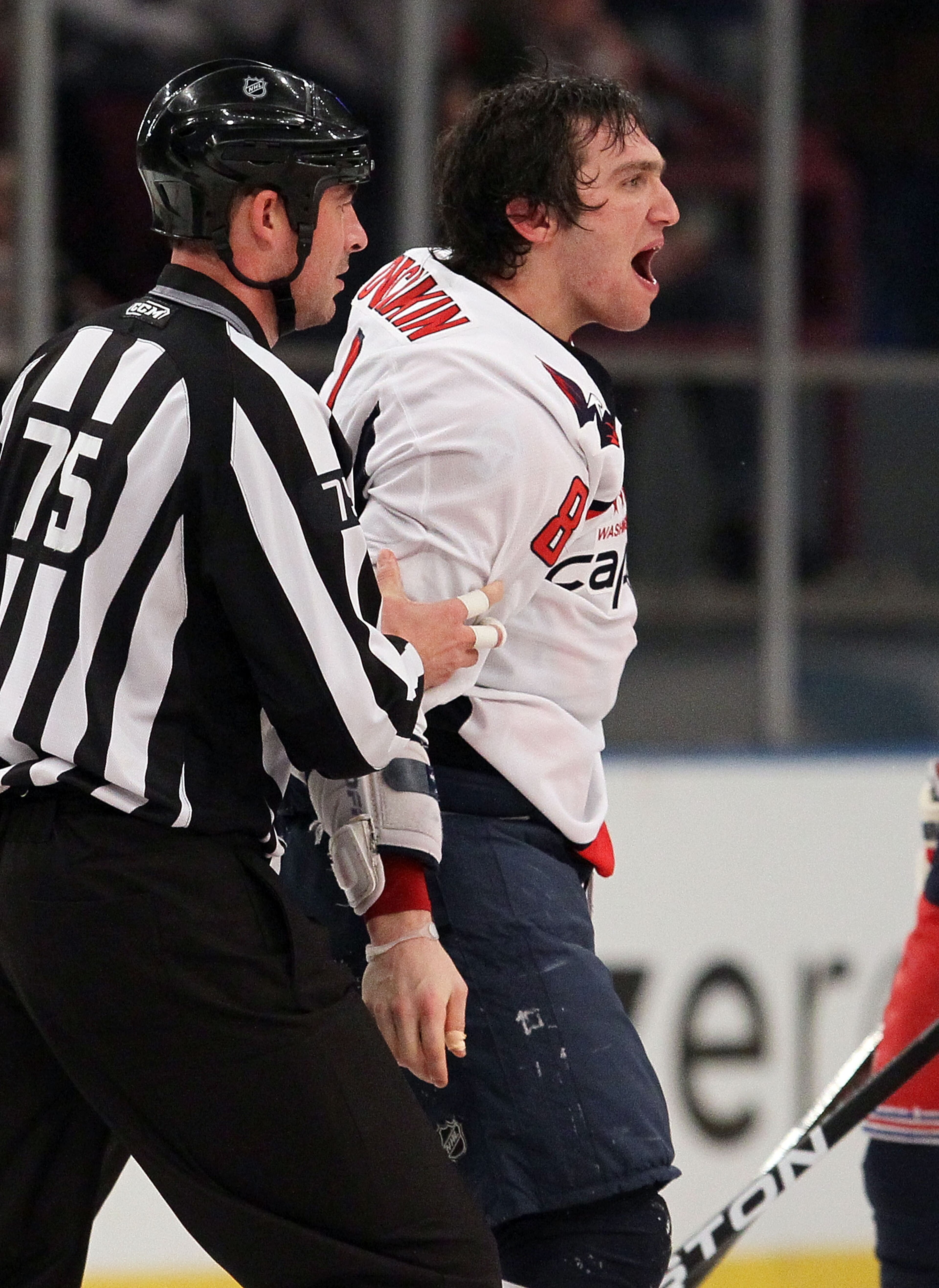 NEW YORK, NY - DECEMBER 12:  Alex Ovechkin #8 of the Washington Capitals reacts after his second period fight against Brandon Dubinsky (not pictured) of the New York Rangers on December 12, 2010 at Madison Square Garden in New York City.  (Photo by Jim Mc